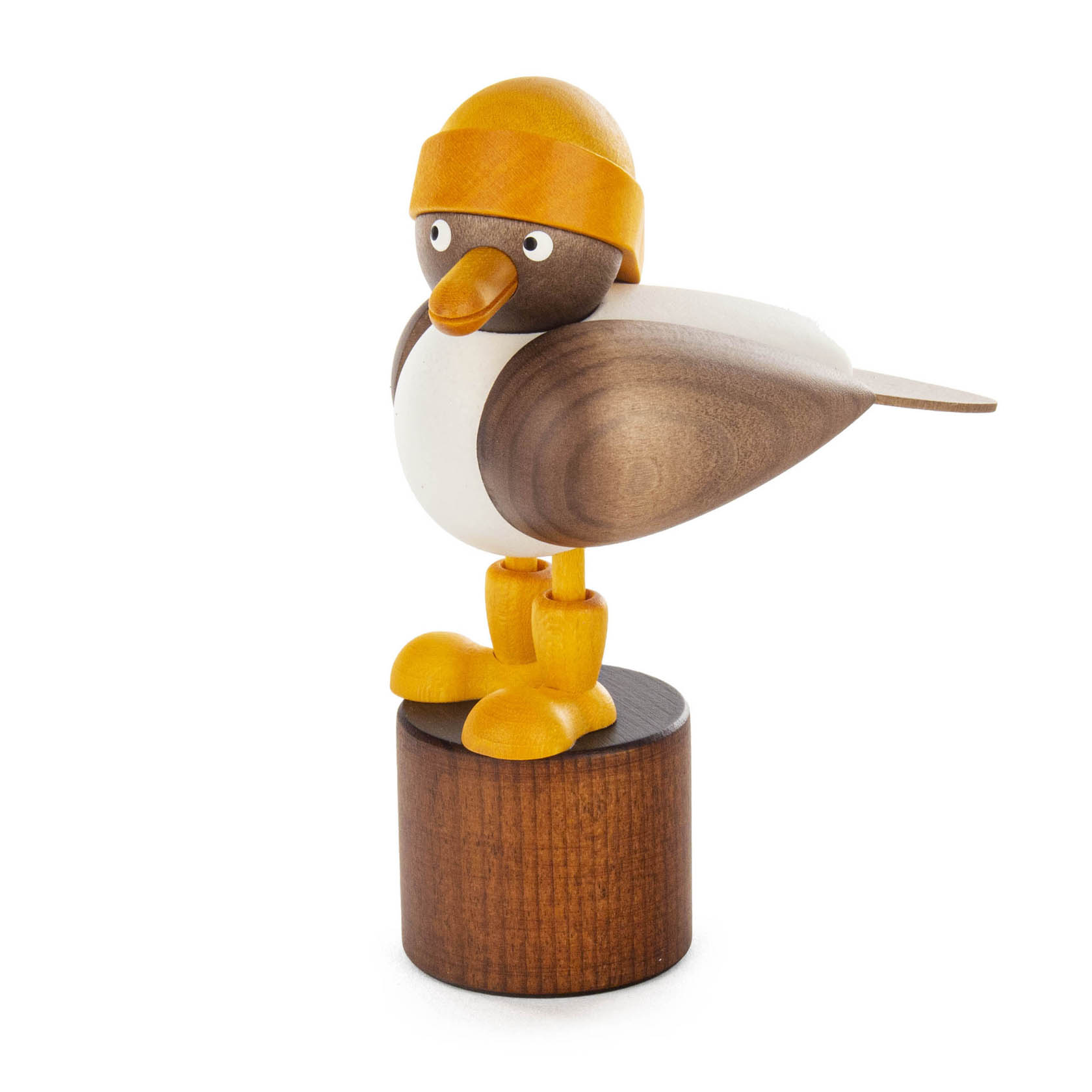 Holzfigur einer Sturmmöwe mit gelbem Südwester und gelben Stiefeln, stehend auf einem runden Holzsockel. im Dregeno Online Shop günstig kaufen