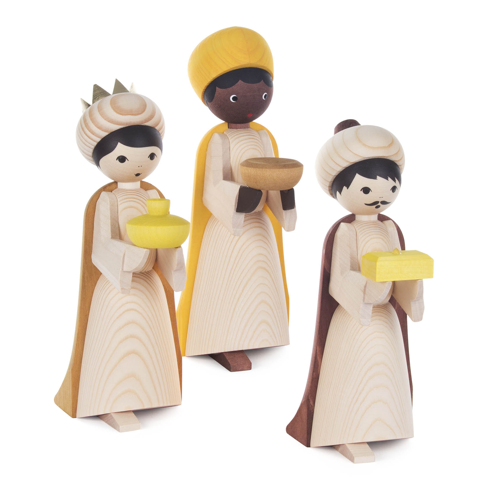Drei Holzfiguren der Heiligen Drei Könige, gebeizt in verschiedenen Farben, mit Gaben in ihren Händen und in traditioneller Kleidung. im Dregeno Online Shop günstig kaufen