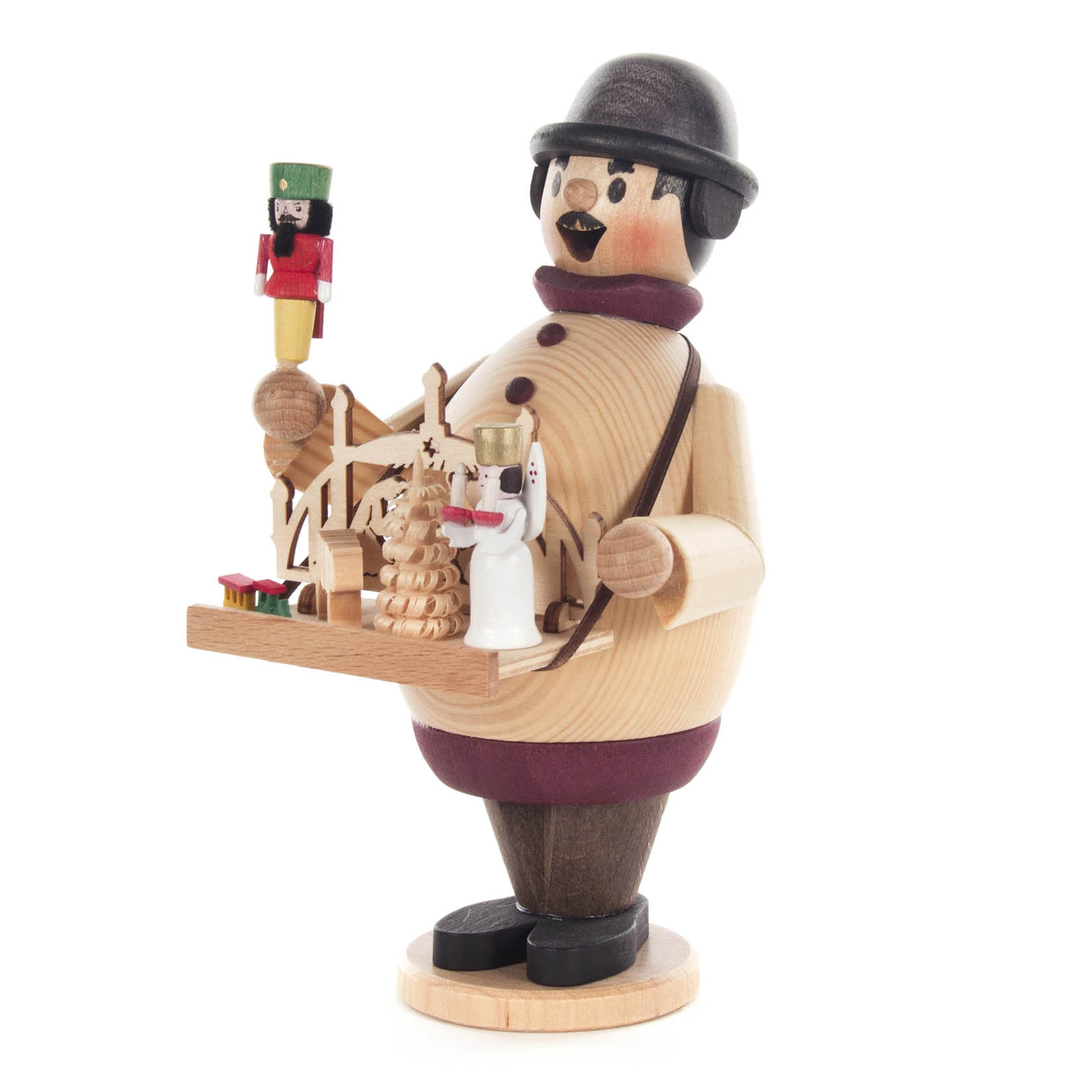 Wooden incense smoker figurine depicting a Christmas market vendor, holding a tray with small Christmas-themed items, including a nutcracker.