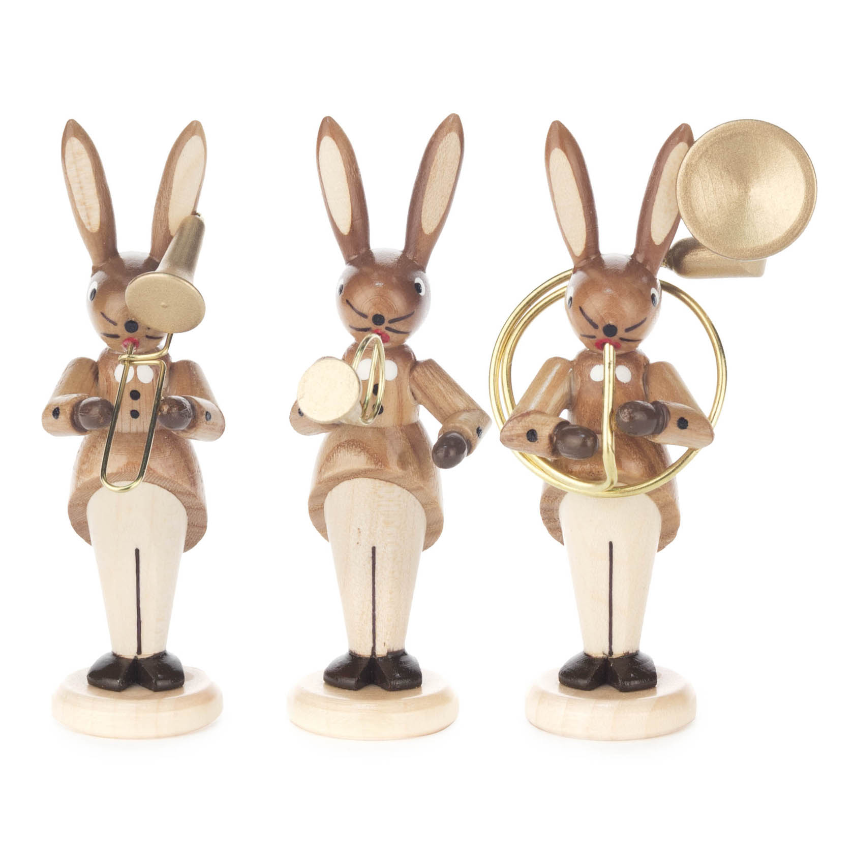 Drei holzgeschnitzte Hasenfiguren in Naturtönen, spielen Zugposaune, Jagdhorn und Sousaphon. im Dregeno Online Shop günstig kaufen