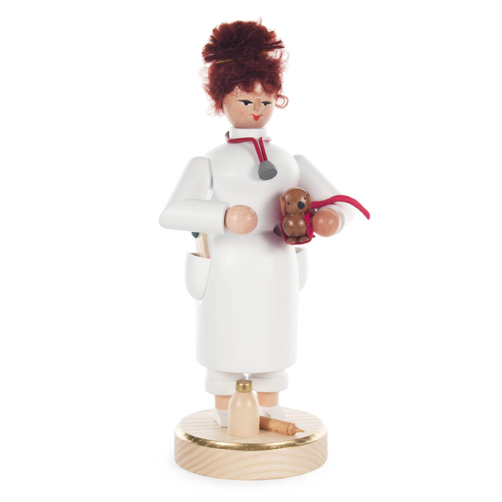 Räucherfigur einer Tierärztin mit hochgestecktem Haar, in einem weißen Kittel und mit Stethoskop. Sie hält eine kleine braune Hundeskulptur in der Hand. im Dregeno Online Shop günstig kaufen