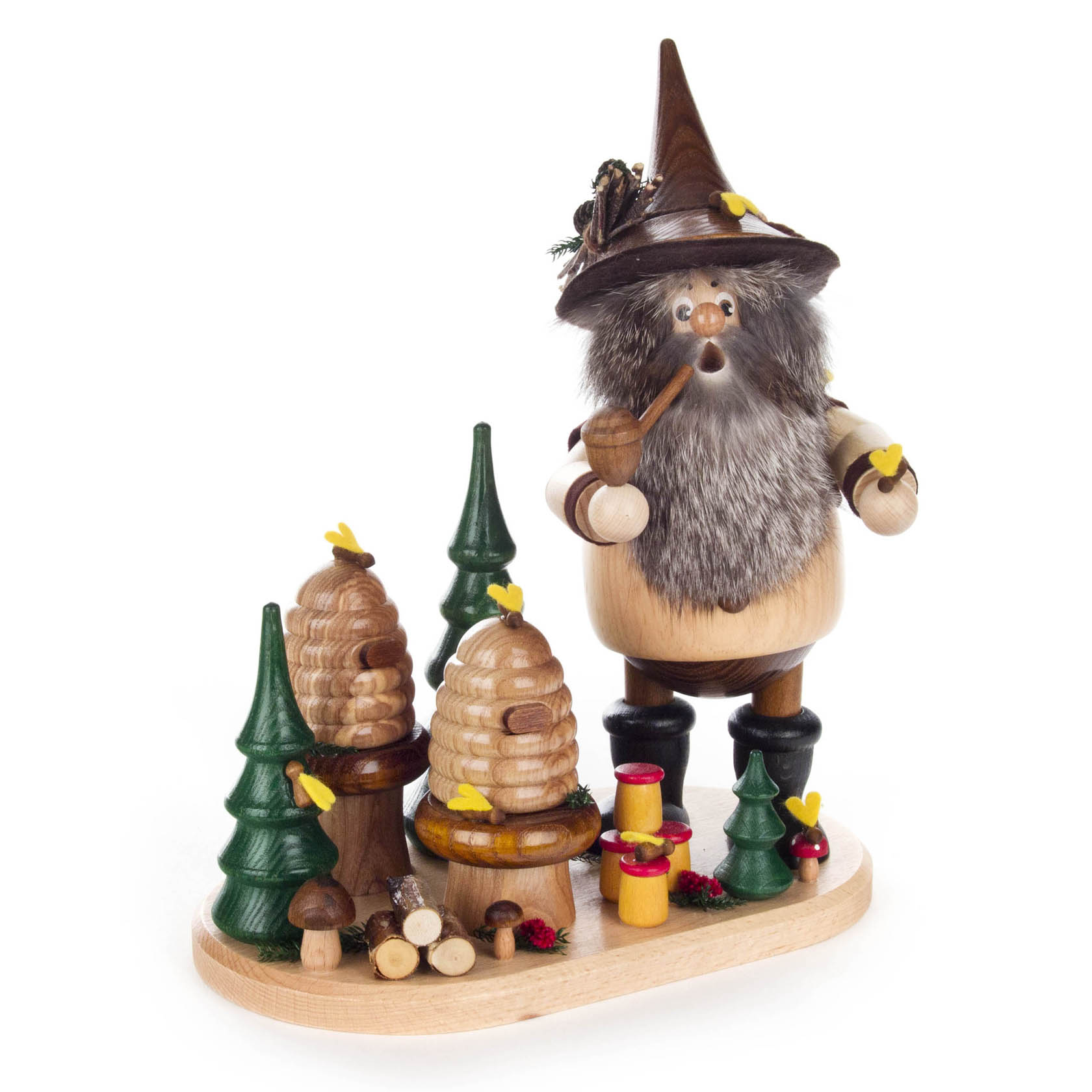 Holzfigur eines Waldwichtels mit braunem Hut und grauem Bart. Er hält eine Pfeife in der Hand. Neben ihm sind Bienenkörbe und kleine Tannenbäume. im Dregeno Online Shop günstig kaufen