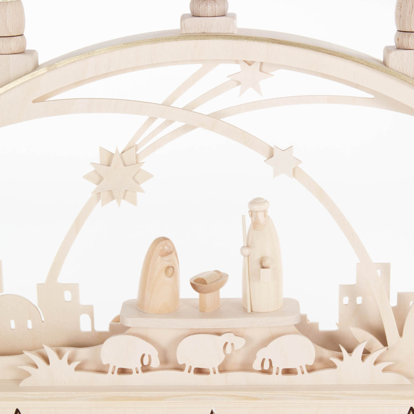 A wooden Christmas arch featuring an electrically lit nativity scene with Mary, Joseph, baby Jesus in the manger, and sheep.