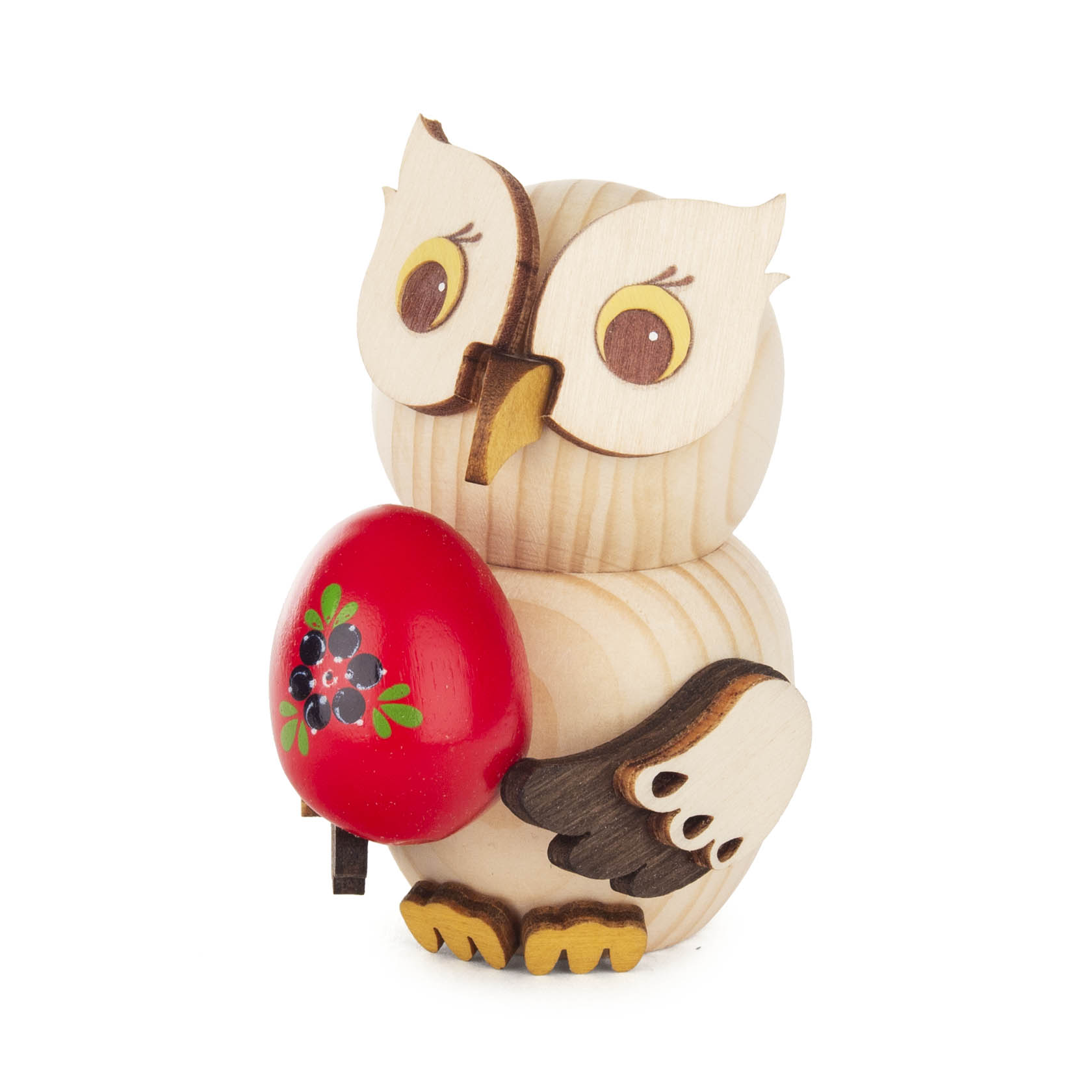 Holzfigur einer Mini-Eule mit großen Augen, die ein rotes Osterei mit schwarzem Blumenmuster in den Flügeln hält. im Dregeno Online Shop günstig kaufen