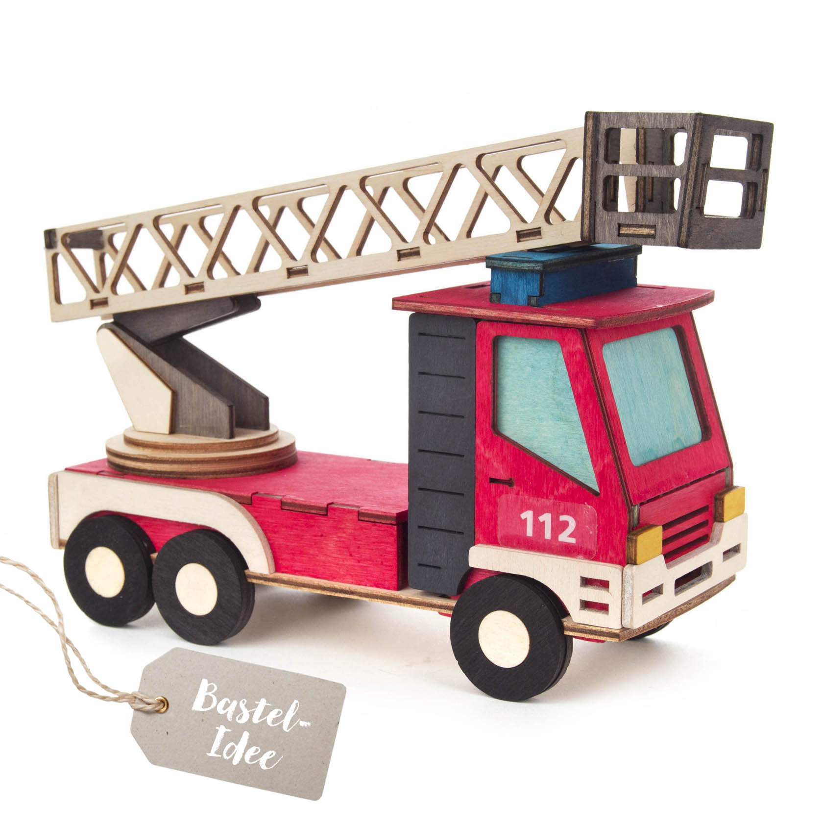 A handcrafted toy fire truck made of colorful wooden pieces, featuring a ladder and the number 112 on its side. im Dregeno Online Shop günstig kaufen