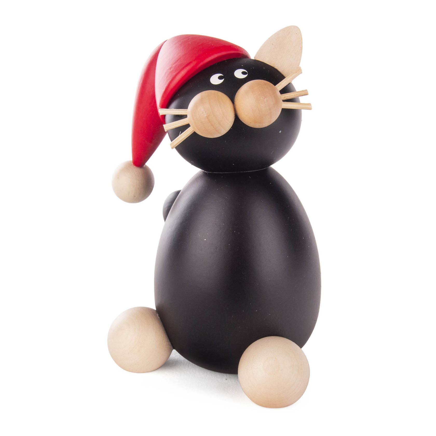 Holzfigur einer sitzenden Katze mit roter Weihnachtsmütze, runden Holzkugeln als Schnurrhaare und großen Augen. im Dregeno Online Shop günstig kaufen