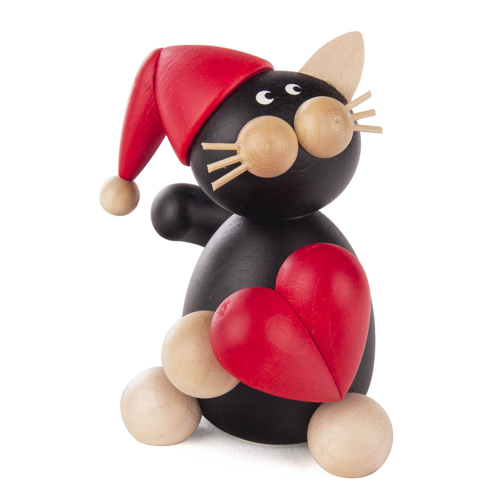 Holzfigur einer schwarzen Katze mit roter Weihnachtsmütze und einem roten Herz in den Pfoten, runde Holzdetails für Gesicht und Pfoten. im Dregeno Online Shop günstig kaufen