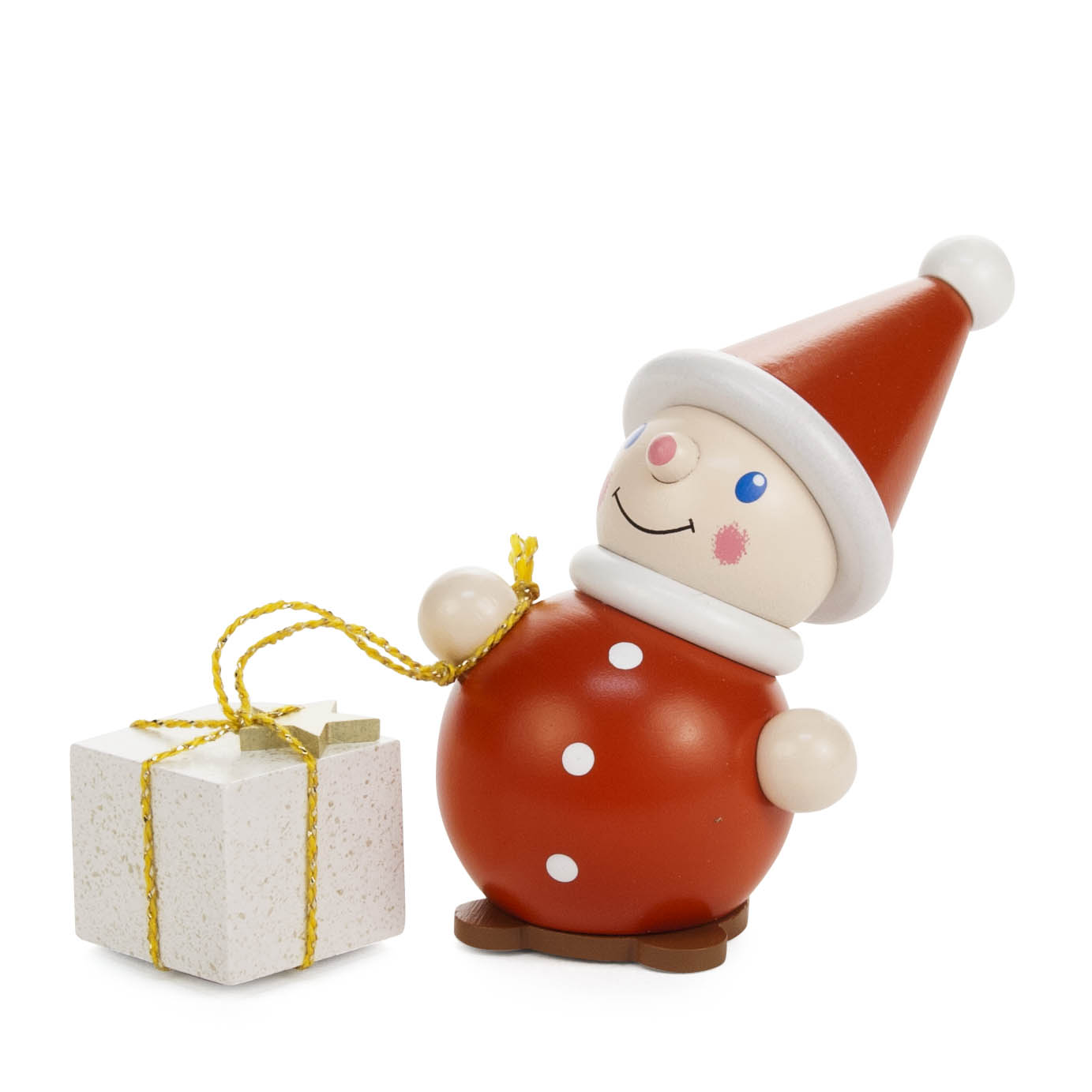 Ein farbenfroher Wichtel mit roter Mütze und Mantel hält ein Geschenk mit goldener Schnur in der Hand. im Dregeno Online Shop günstig kaufen