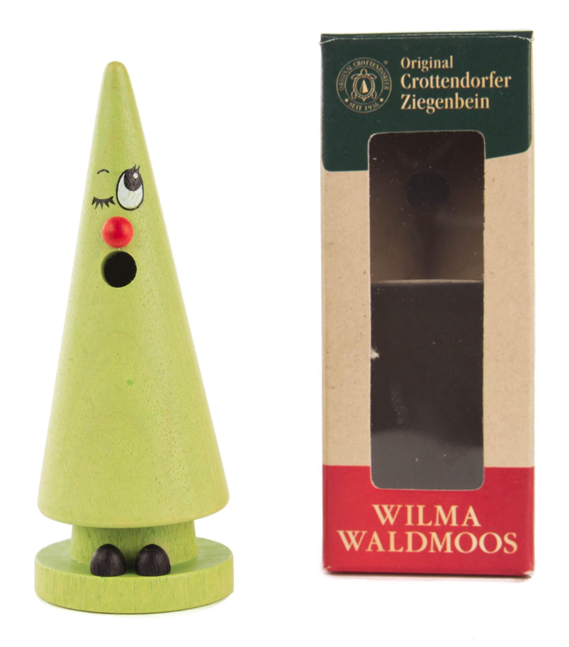 Räucherfigur in Form eines grünen Kegels mit Gesicht und schwarzem Rauchabzug, daneben Originalverpackung mit der Aufschrift 'Wilma Waldmoos'.
