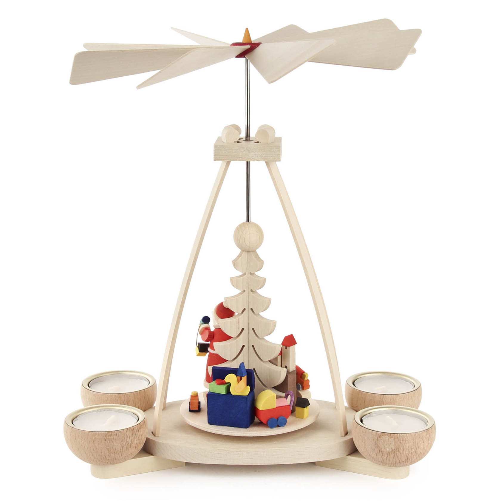 Holzpyramide mit Teelichthaltern, einem Weihnachtsbaum und einer drehbaren Spitze, umgeben von kleinen Holzfiguren wie Geschenken und Spielzeug.