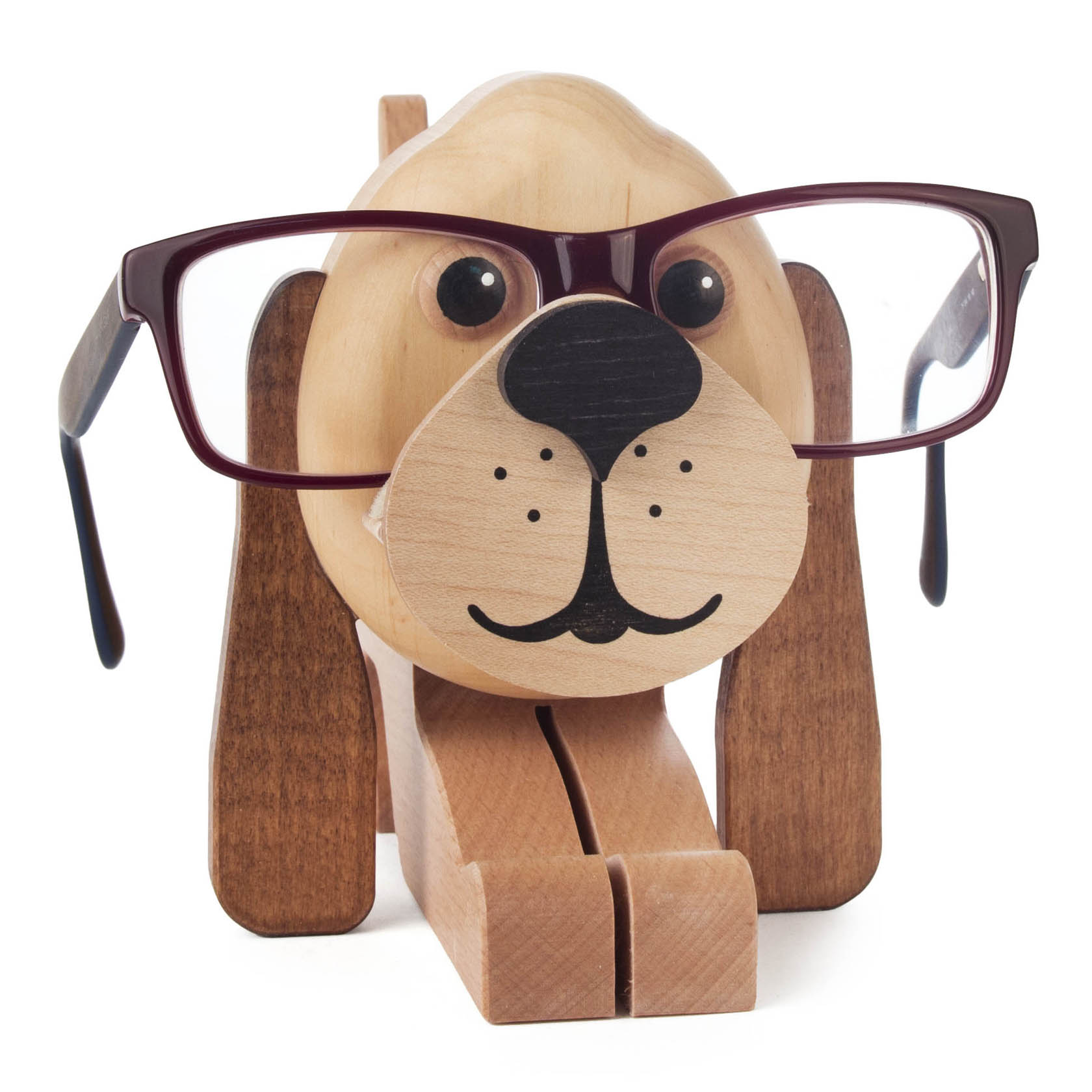 Wooden dog-shaped eyeglass holder with a pair of red-framed glasses resting on its nose, featuring long ears and a carved smile.