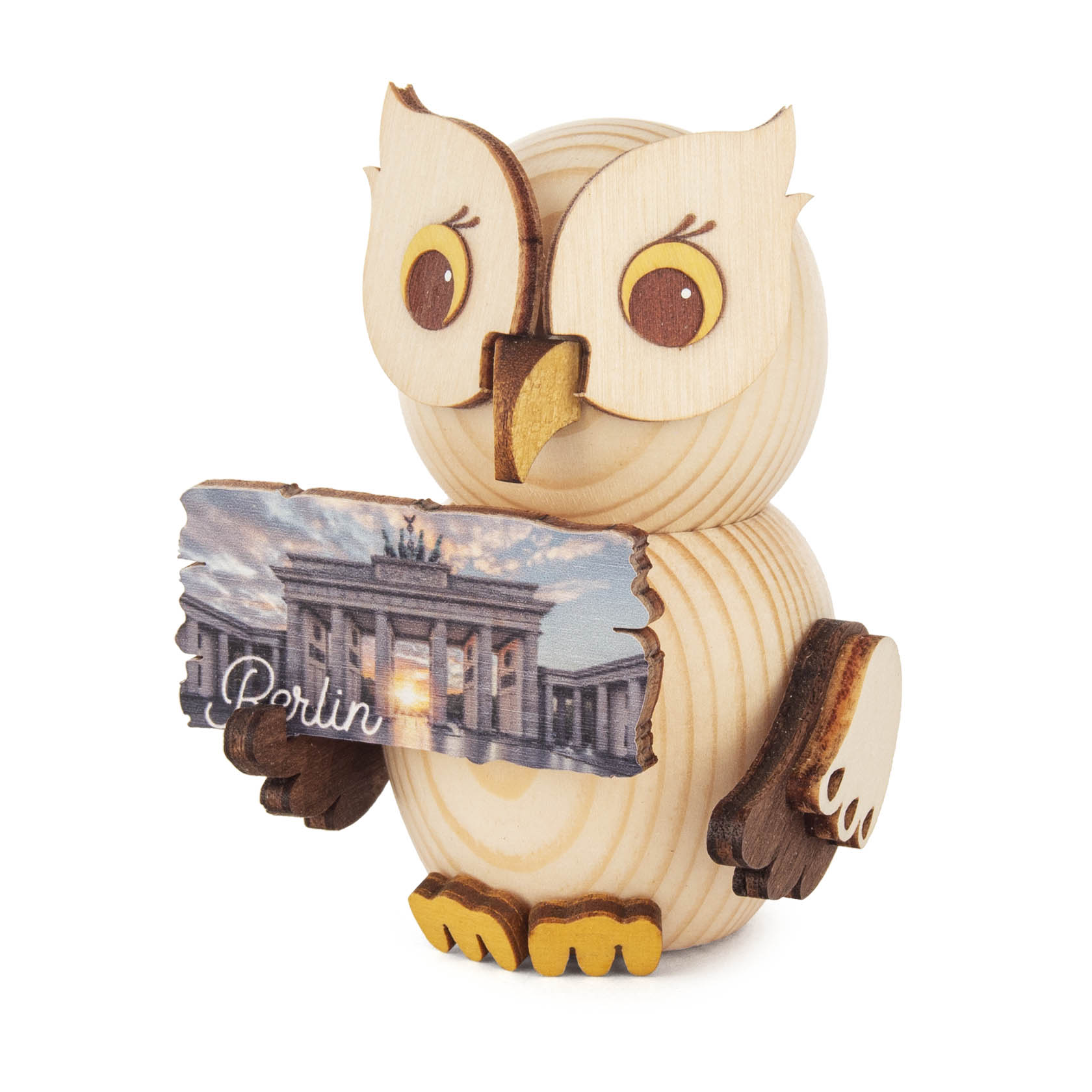 Holzeule mit gelben Augen und Flügeln hält ein Schild mit dem Brandenburger Tor und der Aufschrift 'Berlin'. im Dregeno Online Shop günstig kaufen