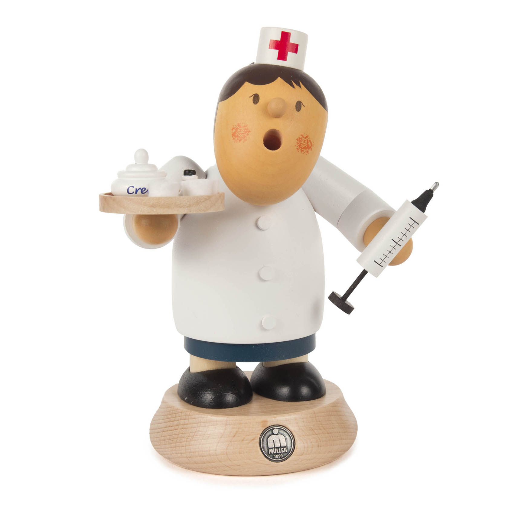 Holzfigur einer Krankenschwester in weißem Kittel mit rotem Kreuz auf der Haube, hält Spritze und Tablett mit Creme. im Dregeno Online Shop günstig kaufen