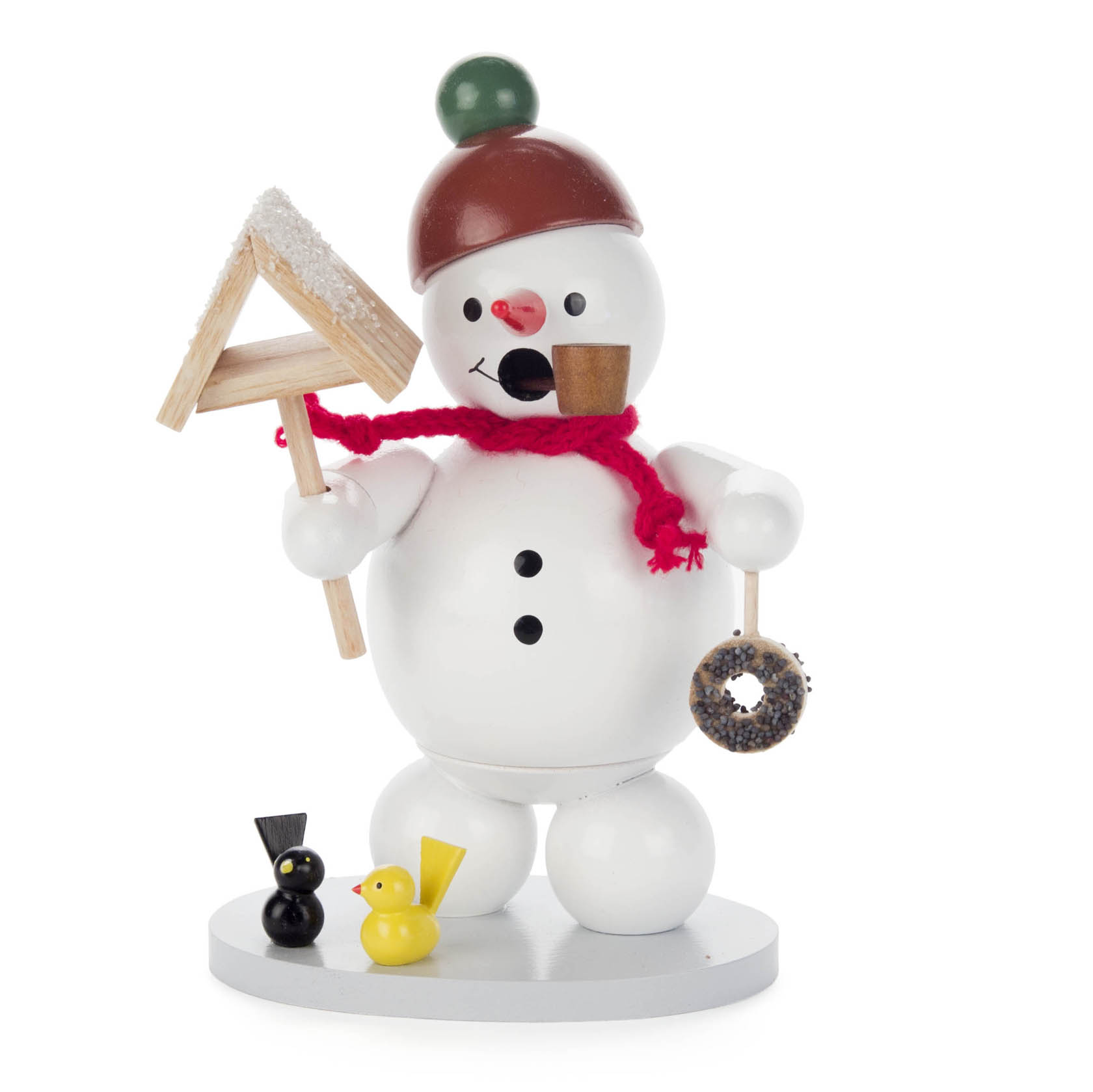 Ein Räuchermann in Form eines Schneemanns mit rotem Schal hält ein Vogelhaus in der Hand. Zwei kleine Vögel und ein Kranz liegen zu seinen Füßen. im Dregeno Online Shop günstig kaufen