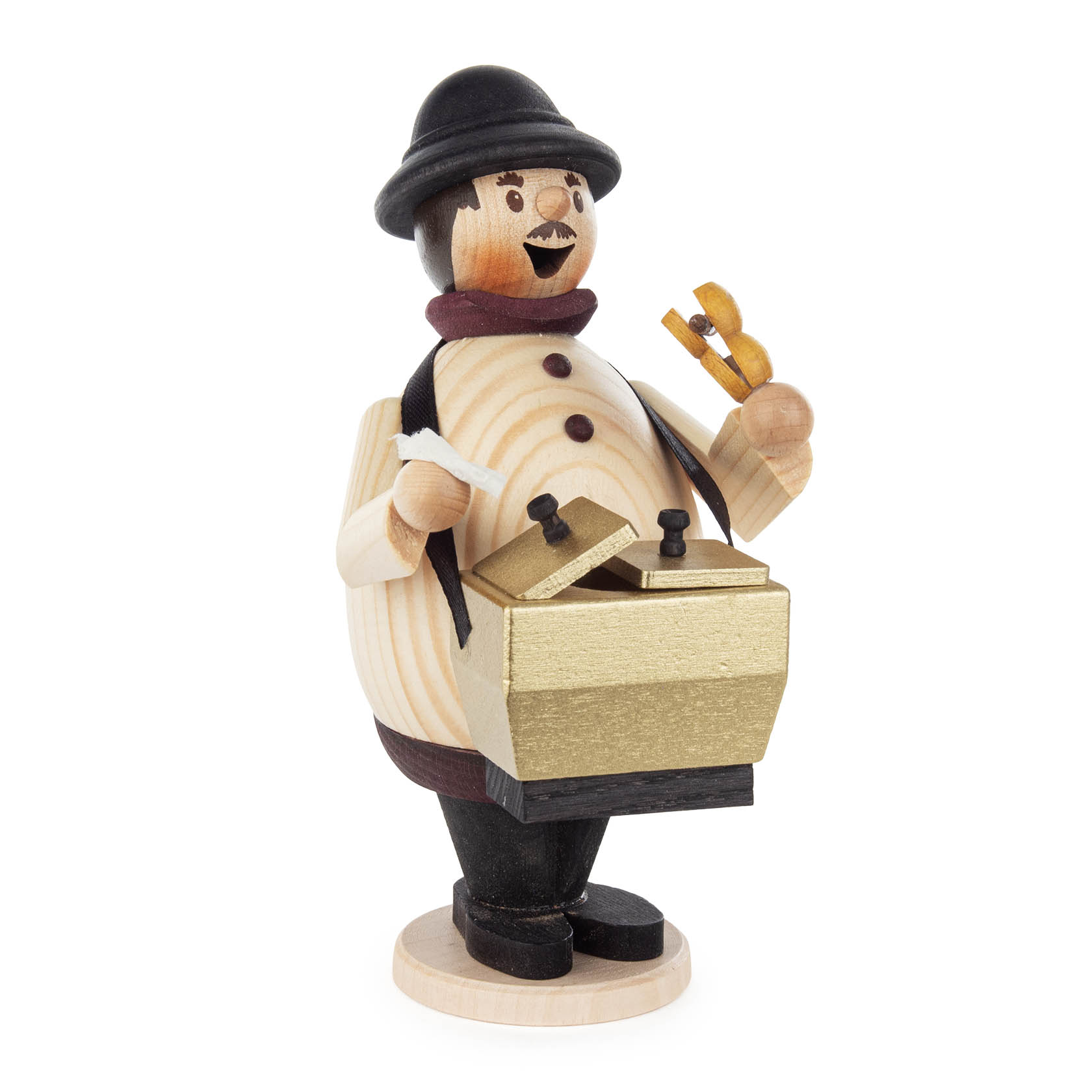 Wooden smoking man figure dressed as a sausage vendor, holding a hot dog in one hand and a serving tray in front.