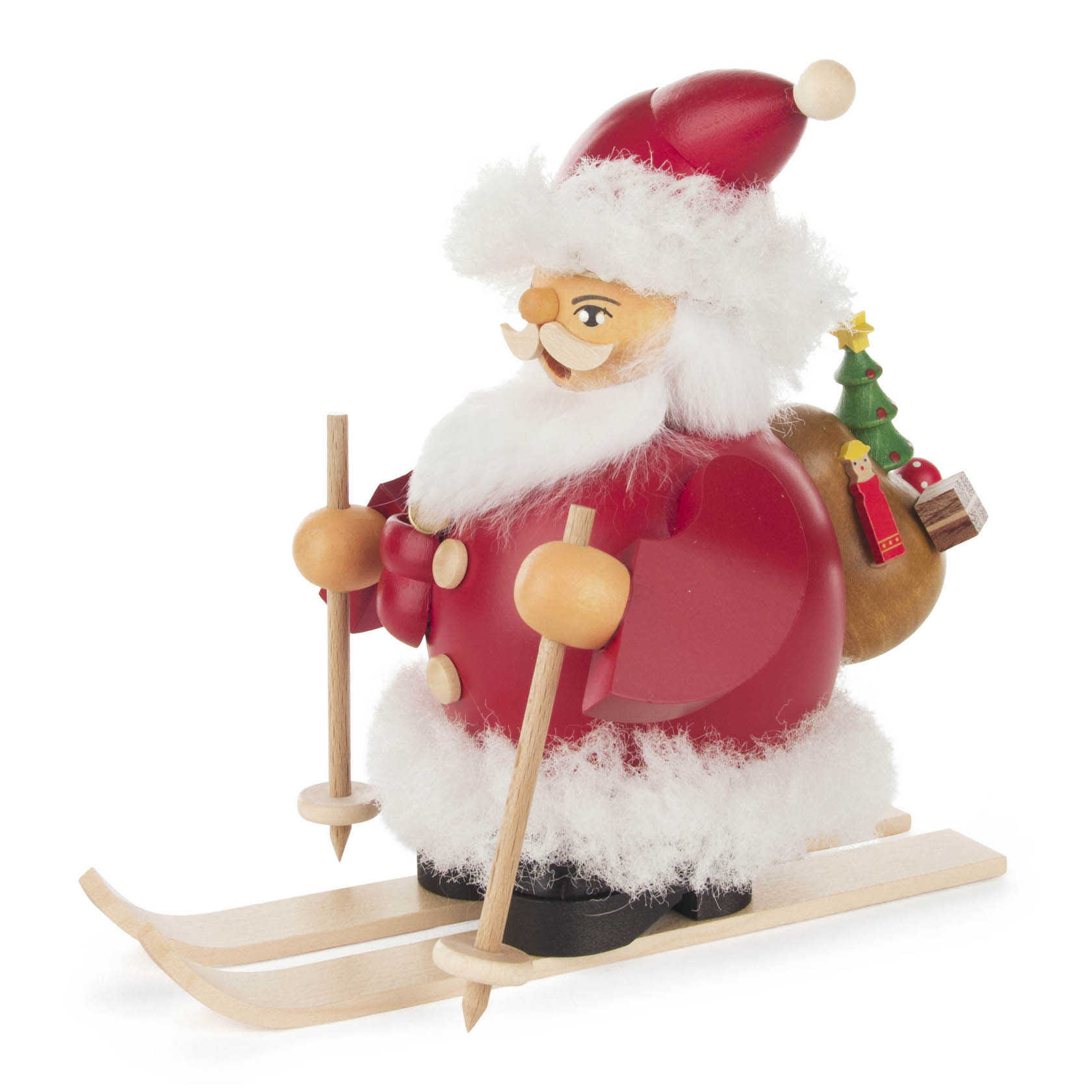 Räuchermann in Form eines Weihnachtsmanns mit Skiern und Skistöcken, trägt roten Mantel und Sack, geschmückt mit kleinem Weihnachtsbaum. im Dregeno Online Shop günstig kaufen