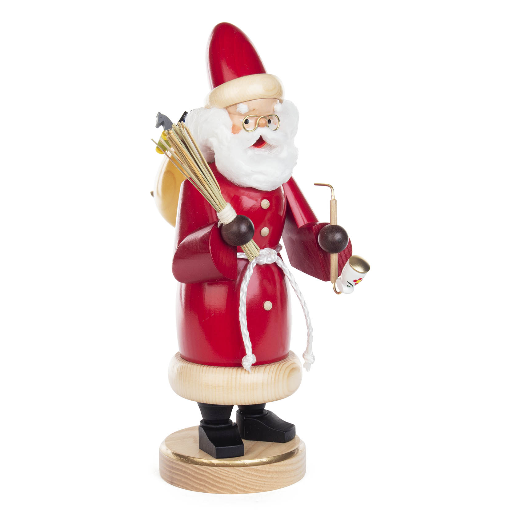 A wooden incense smoker figurine of a Santa Claus in red coat, holding a broom and a sack with gifts on his back.