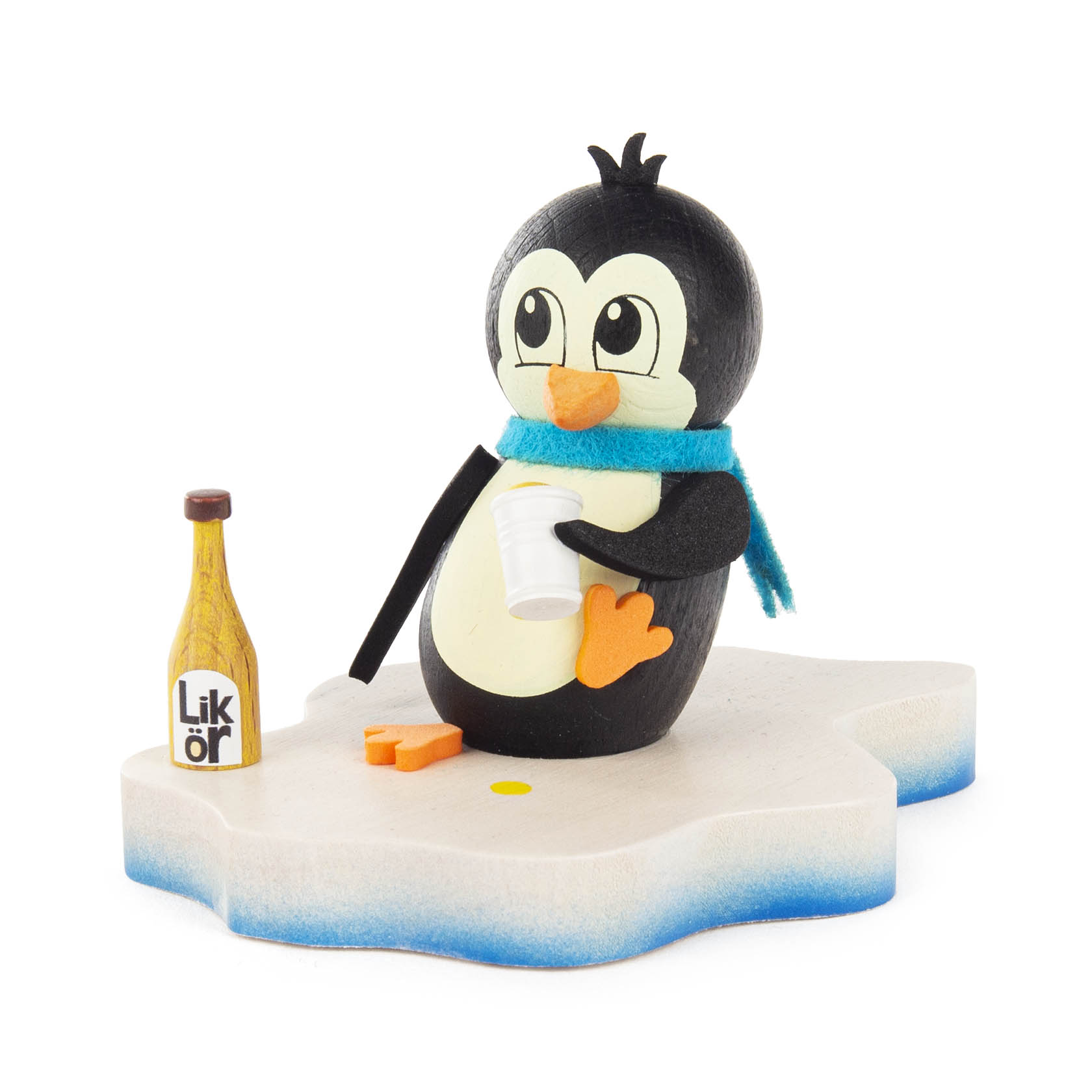 Holzfigur eines Pinguins mit türkisem Schal und einem Becher in der Flosse. Neben ihm steht eine Flasche mit der Aufschrift 'Likör'. im Dregeno Online Shop günstig kaufen