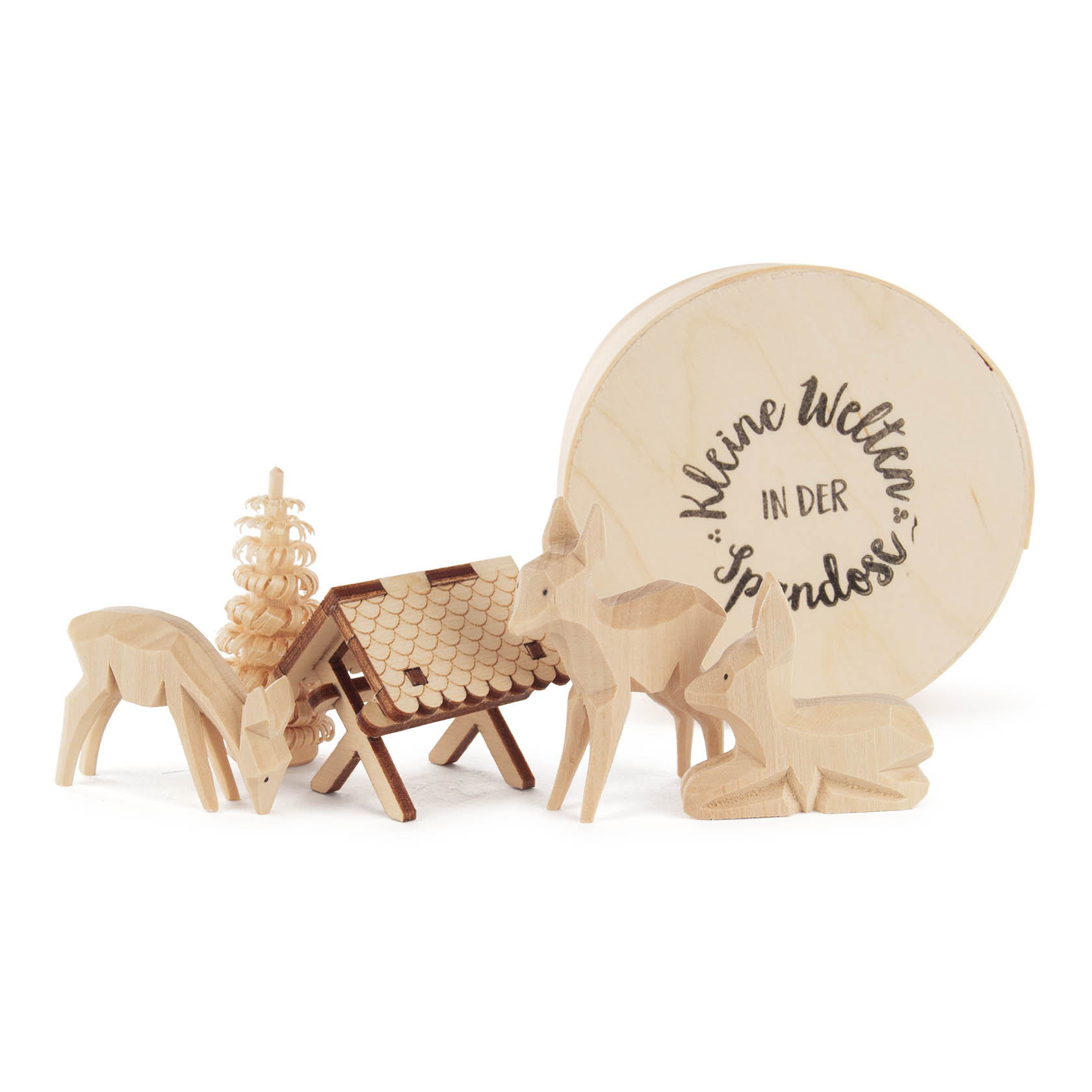 Holzmodelle von Rehen, einem Futtertrog und einem Baum vor einer runden Dose mit der Aufschrift 'Kleine Welten in der Spandose'. im Dregeno Online Shop günstig kaufen