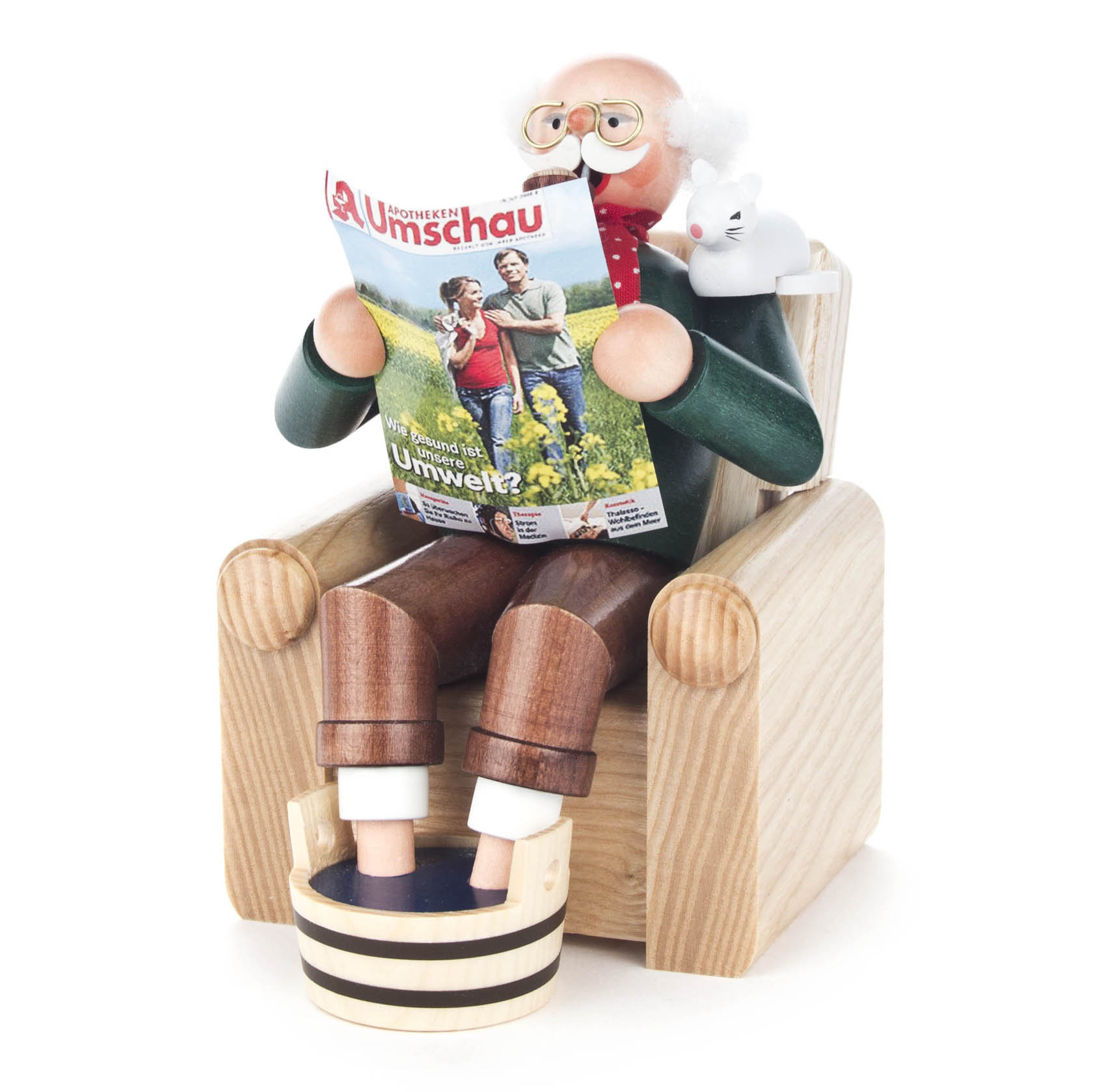 A wooden incense figure of a grandfather sitting in an armchair, holding a magazine and having a small white mouse on his shoulder. im Dregeno Online Shop günstig kaufen