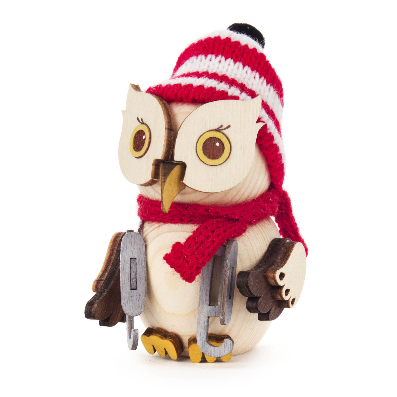 Kleine Holzfigur einer Eule mit rotem Schal und Mütze sowie Schlittschuhen. im Dregeno Online Shop günstig kaufen