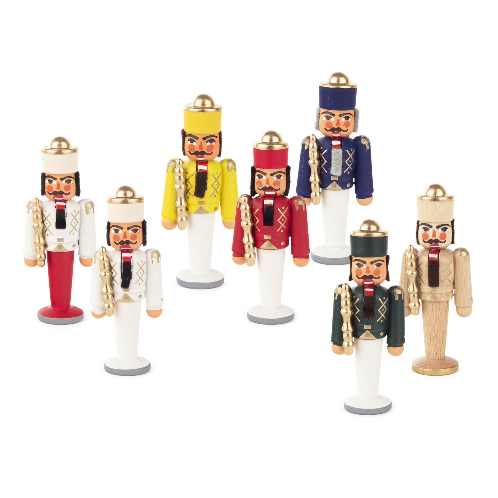 Sieben Mini-Nussknacker Könige in unterschiedlichen Farben, mit typischen Uniformen und roten Wangen, stehen in einer Gruppe. im Dregeno Online Shop günstig kaufen