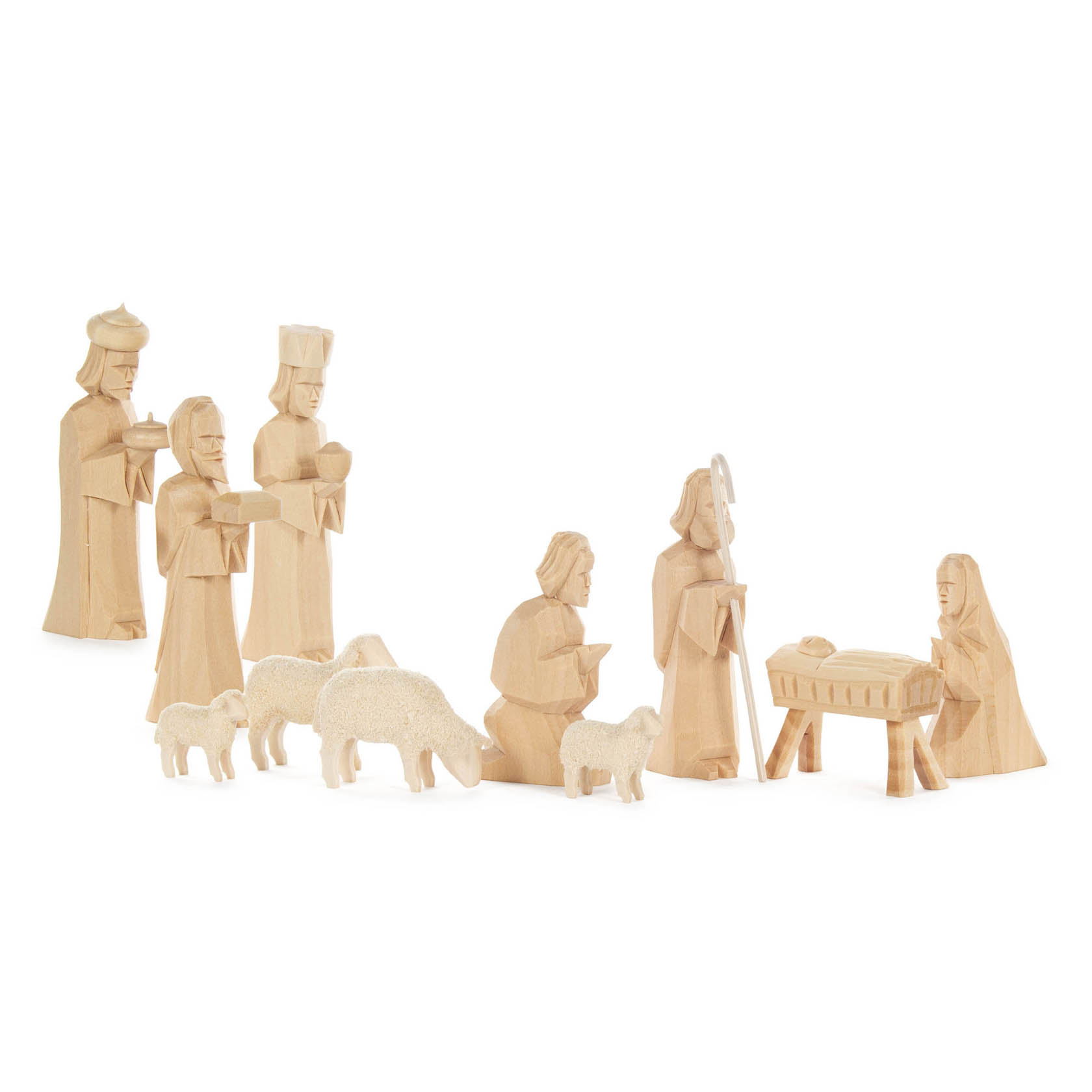 Elf geschnitzte Krippenfiguren aus Holz in natürlicher Optik. Zu sehen sind Maria, Josef, das Jesuskind in der Krippe, die Heiligen Drei Könige und mehrere Schafe. im Dregeno Online Shop günstig kaufen