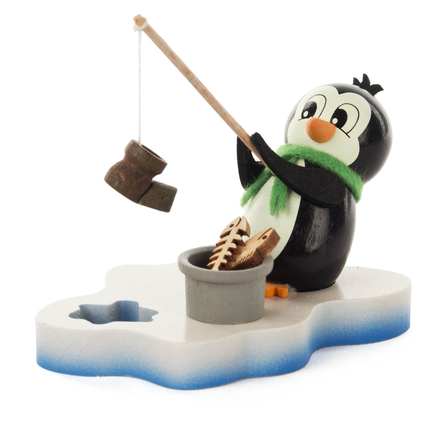 Kleiner Pinguin auf einer Eisscholle, der mit einer Angel einen alten Schuh aus einem Eimer mit Fischgräten angelt. im Dregeno Online Shop günstig kaufen