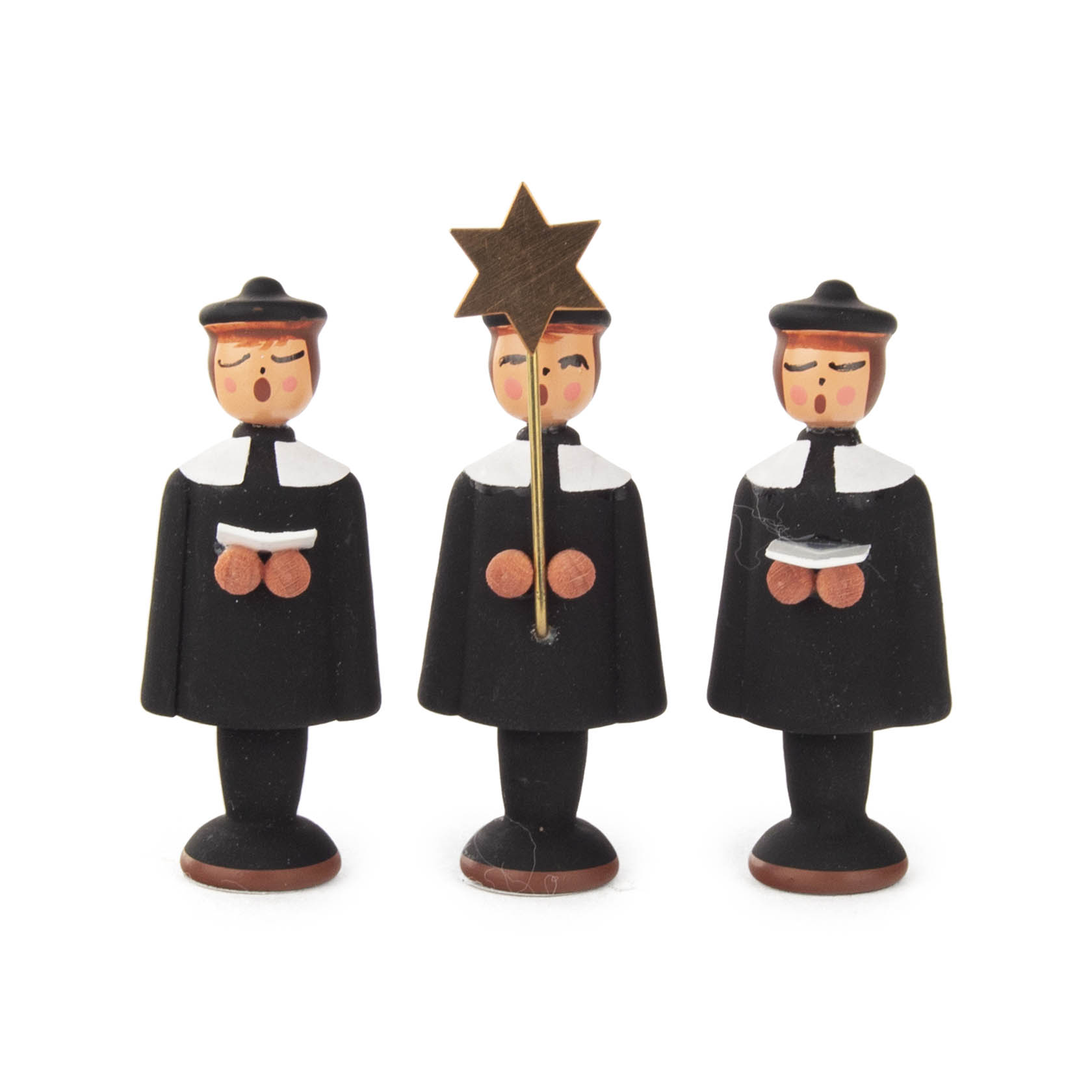 Drei schwarze Kurrendesänger-Figuren aus Holz, die linke mit Notenblatt, die mittlere hält einen Stern, die rechte hat leere Hände. im Dregeno Online Shop günstig kaufen