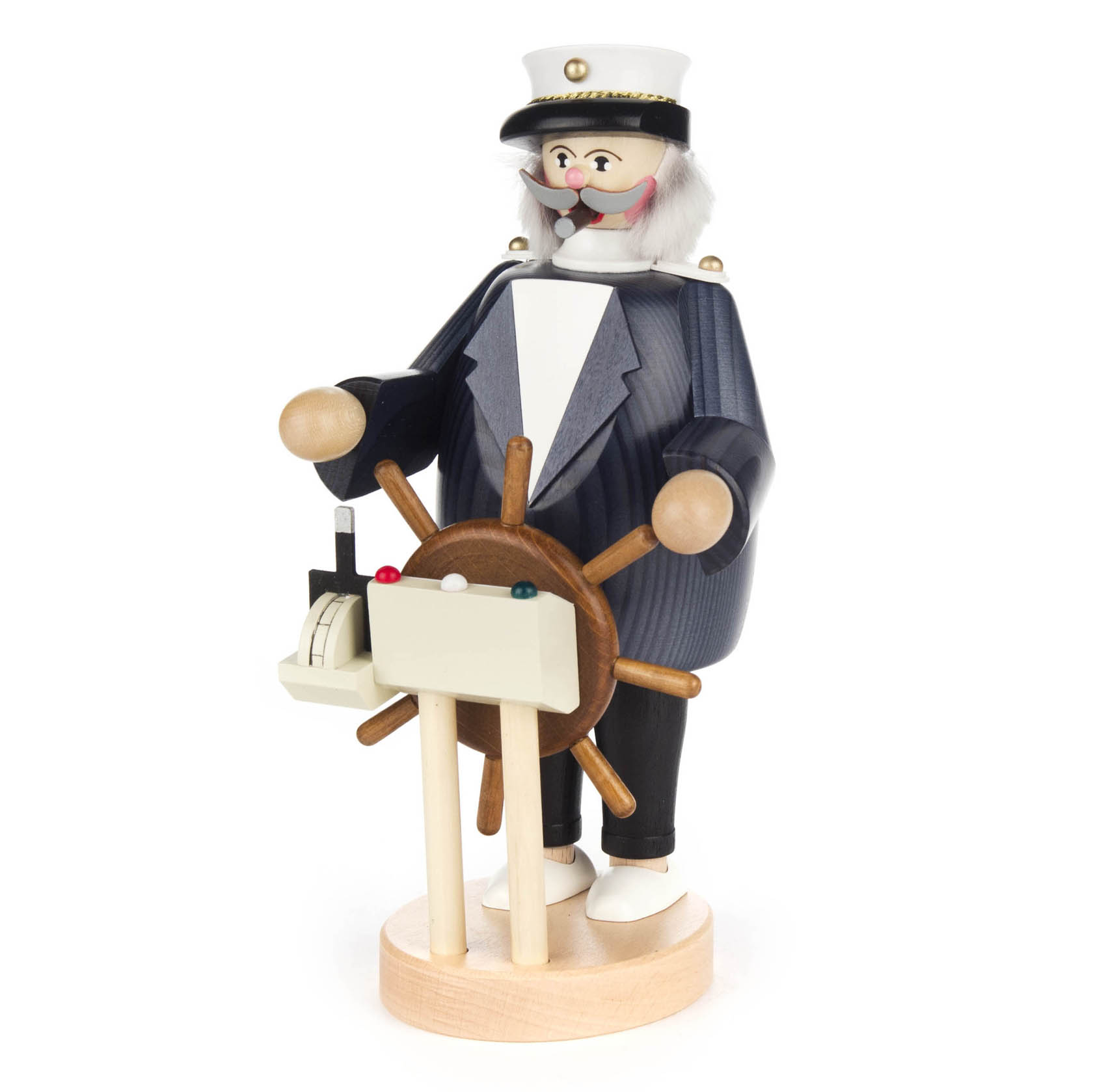 Holzfigur eines Kapitäns in Uniform mit Kapitänsmütze, am Steuerrad stehend.