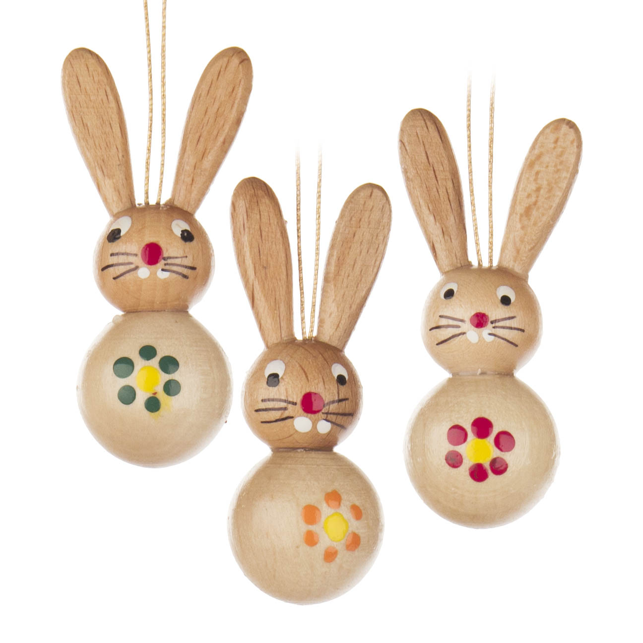 Drei hölzerne Hasenanhänger mit natürlichen Holzköpfen und Körpern, verziert mit bunten Blumenmustern auf den Bäuchen. im Dregeno Online Shop günstig kaufen