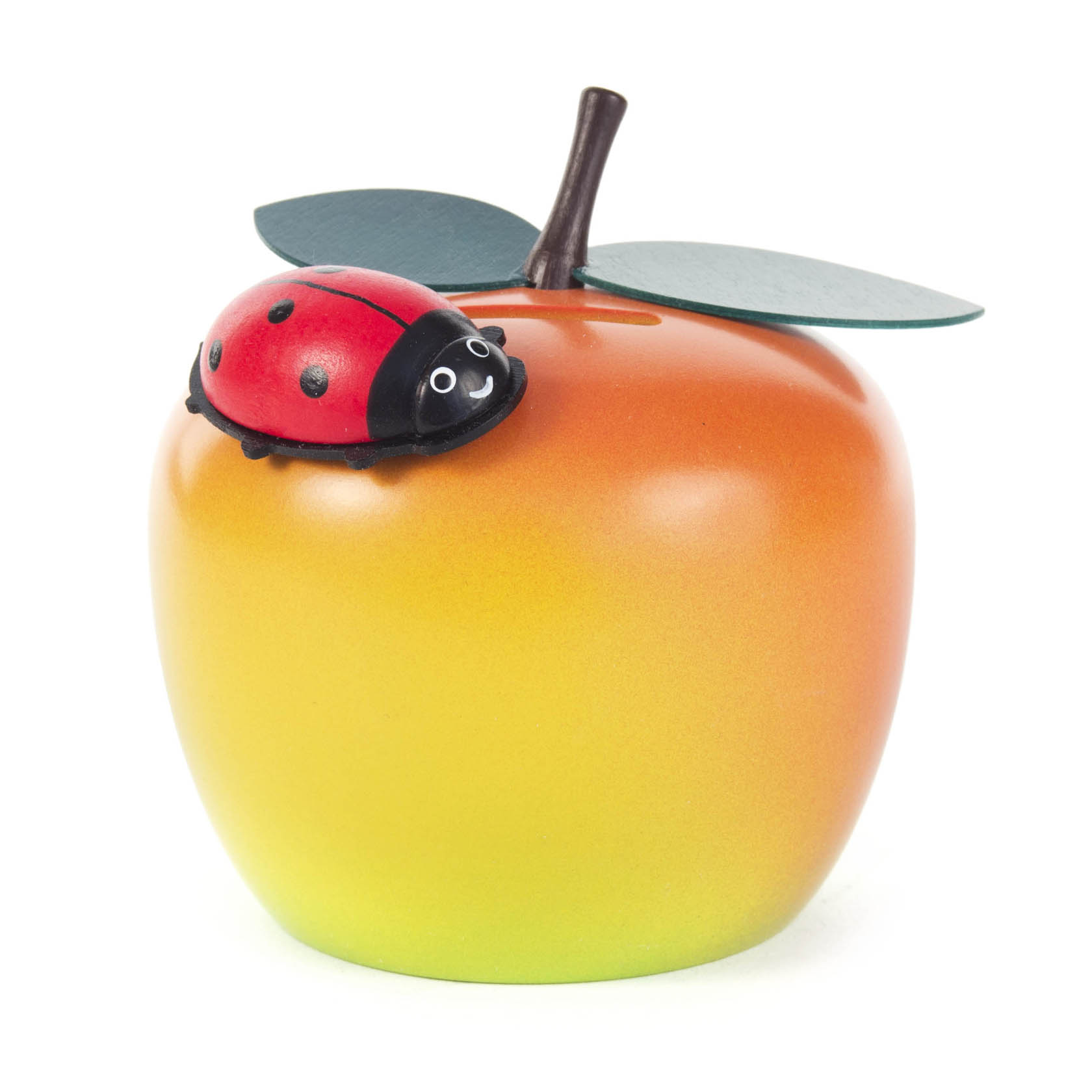 Eine Apfel-Spardose mit einem Marienkäfer darauf. Der Apfel ist orange-grün und hat ein Blatt und einen Stiel oben. im Dregeno Online Shop günstig kaufen