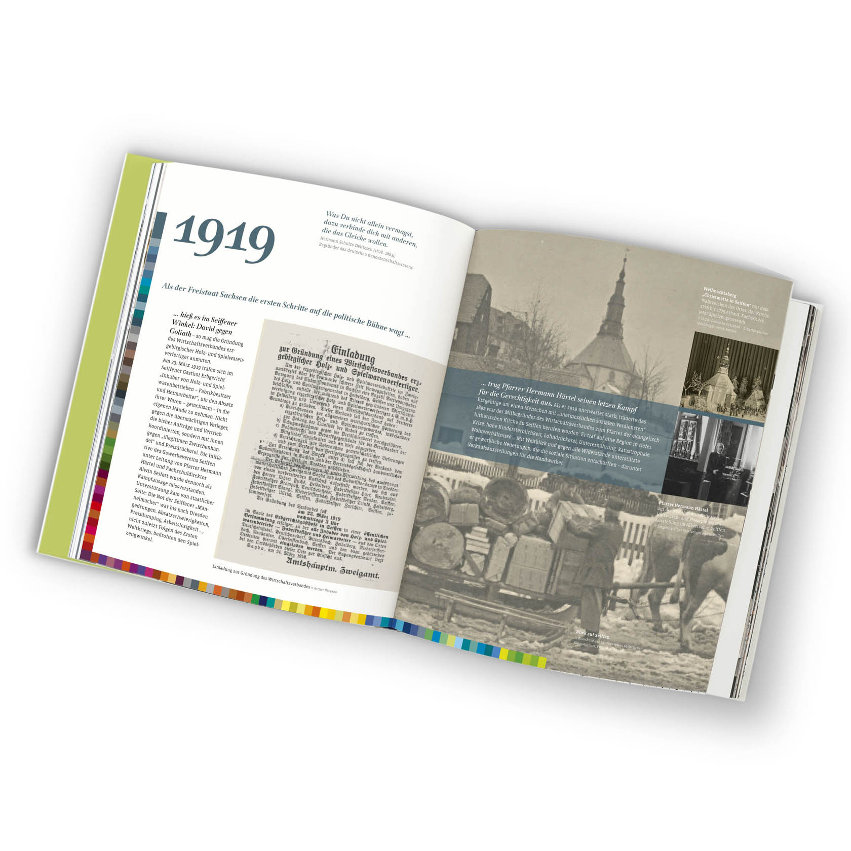 Ein aufgeschlagenes Buch mit dem Titel 'Das Dregeno-Jahr100Buch 1919-2019'. Links sind Text und rechts historische Bilder zu sehen.