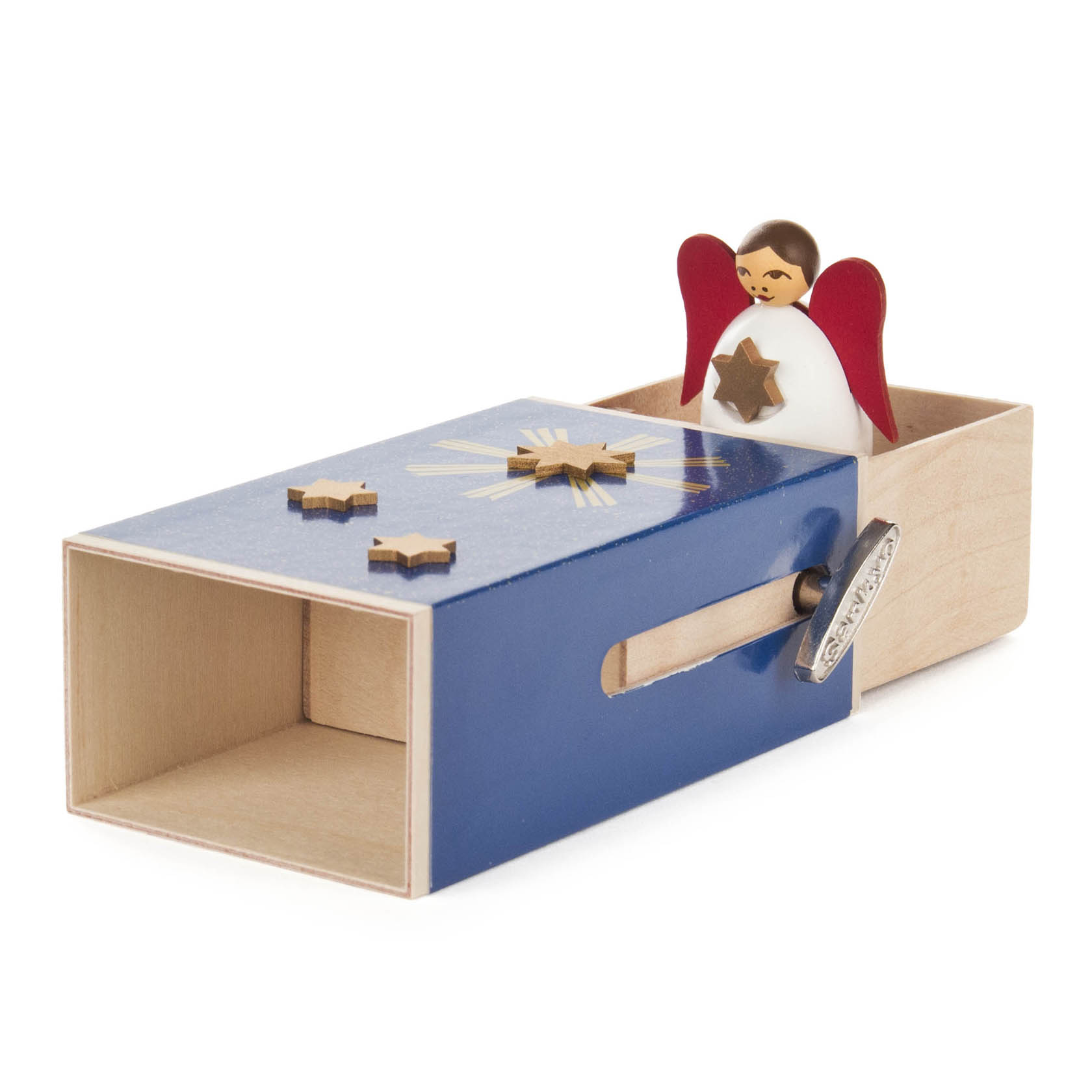 Holzbox mit blauer Schiebeschachtel, die einen Engel mit rotem Flügel und goldenem Stern enthält. Seitlich ist eine Kurbel angebracht.
