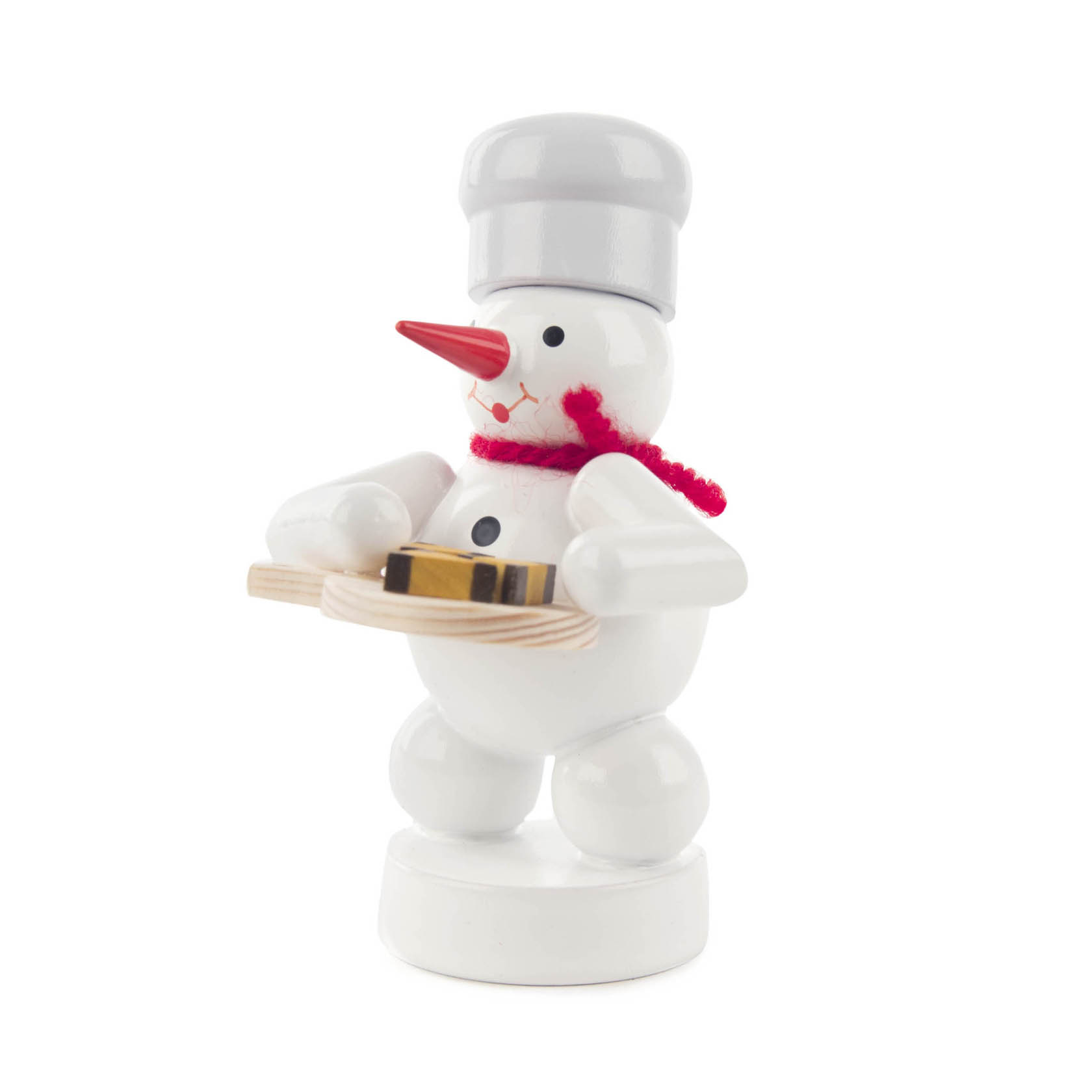 Ein Schneemann in Bäcker-Kleidung mit rotem Schal und Bäckermütze hält ein Tablett mit Nussecken. im Dregeno Online Shop günstig kaufen