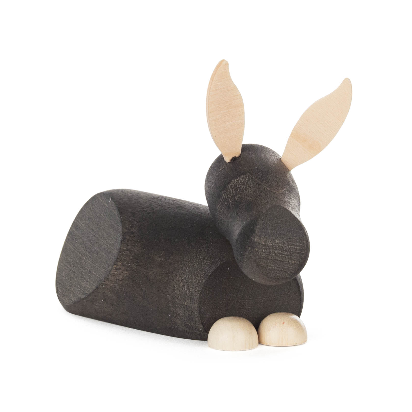 Eine moderne Holzfigur eines Esels in liegender Position, mit anthrazitfarbener Oberfläche und naturbelassenen Ohren und Hufen. im Dregeno Online Shop günstig kaufen