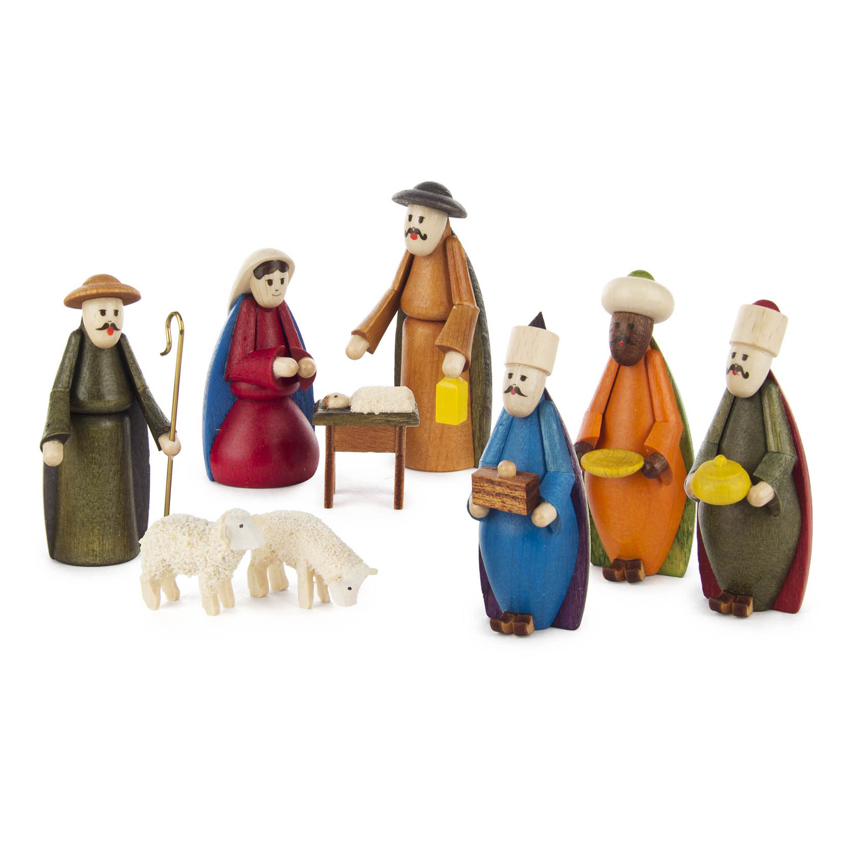 Neunteilige, farbenfrohe Krippefiguren-Szene mit Maria, Josef, Hirte, drei Königen, zwei Schafen und einer Krippe mit Jesuskind. im Dregeno Online Shop günstig kaufen
