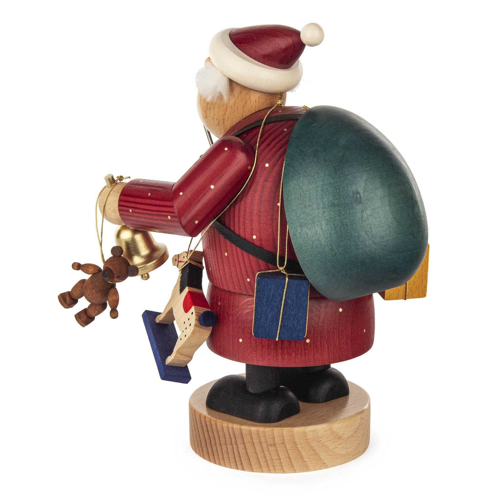 Ein handgefertigter Räuchermann in Form eines Weihnachtsmannes, 20 cm groß, in rotem Mantel mit einem blauen Geschenksack und kleinen Anhängern wie Teddybär und Glocke.