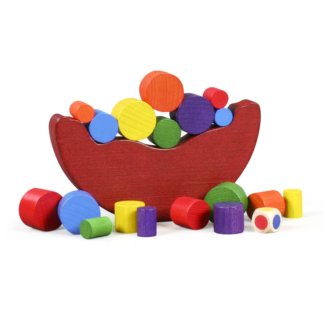 Ein Balance-Spiel aus bunten Holzblöcken, die auf einem roten, halbmondförmigen Sockel gestapelt sind. Ein Farbwürfel liegt daneben. im Dregeno Online Shop günstig kaufen
