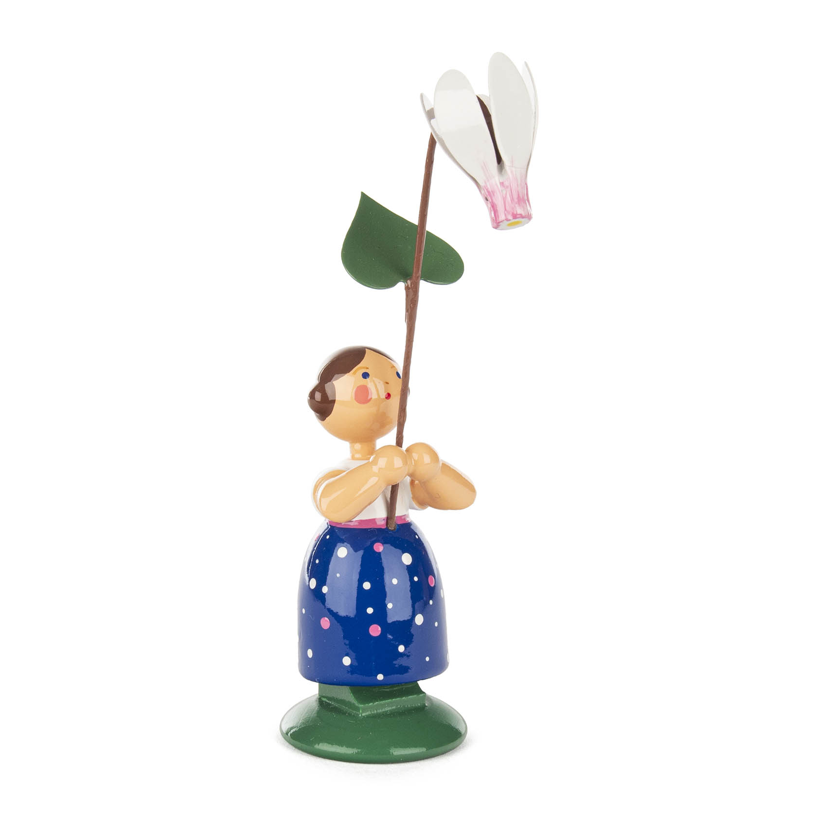 Holzfigur eines Mädchens mit Schultertuch und gepunktetem Rock, das ein weißes Alpenveilchen hochhält. im Dregeno Online Shop günstig kaufen
