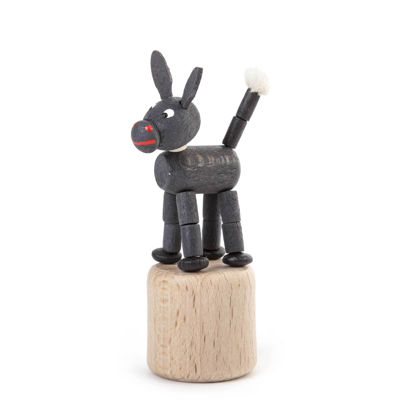 Ein Wackeltier in Form eines Esels aus Holz auf einer runden Basis. Der Esel hat einen grauen Körper, rote Augen und schwarze Ohren. im Dregeno Online Shop günstig kaufen
