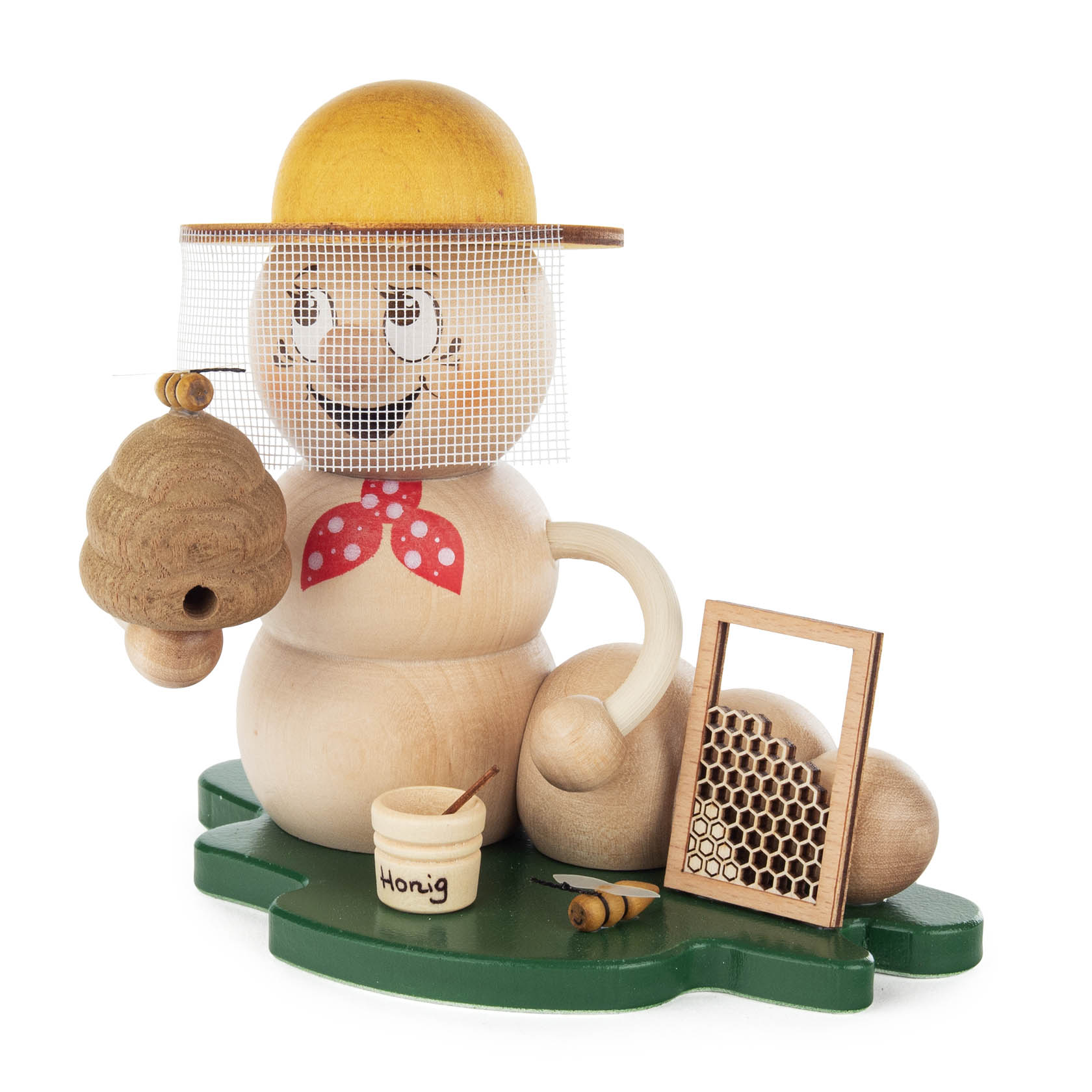 Holzfigur eines lächelnden Wurms mit gelbem Hut und rotem Halstuch, der einen Bienenstock in der Hand hält und neben Honigglas und Wabe sitzt. im Dregeno Online Shop günstig kaufen