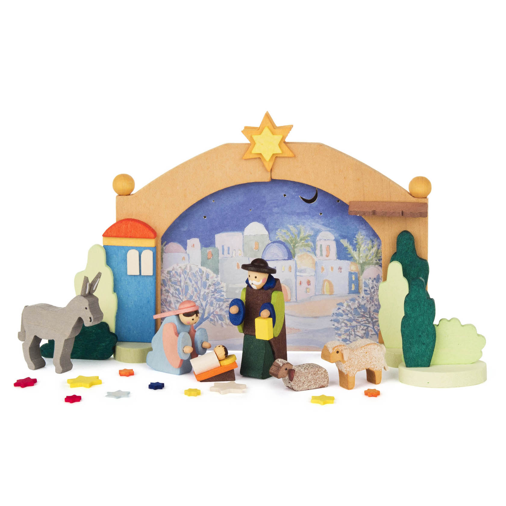 Miniatur-Weihnachtskrippe mit Maria, Josef, Jesus in der Krippe, einem Esel, Schaf und Sternen im Vordergrund, Hintergrund mit Stadtsilhouette. im Dregeno Online Shop günstig kaufen
