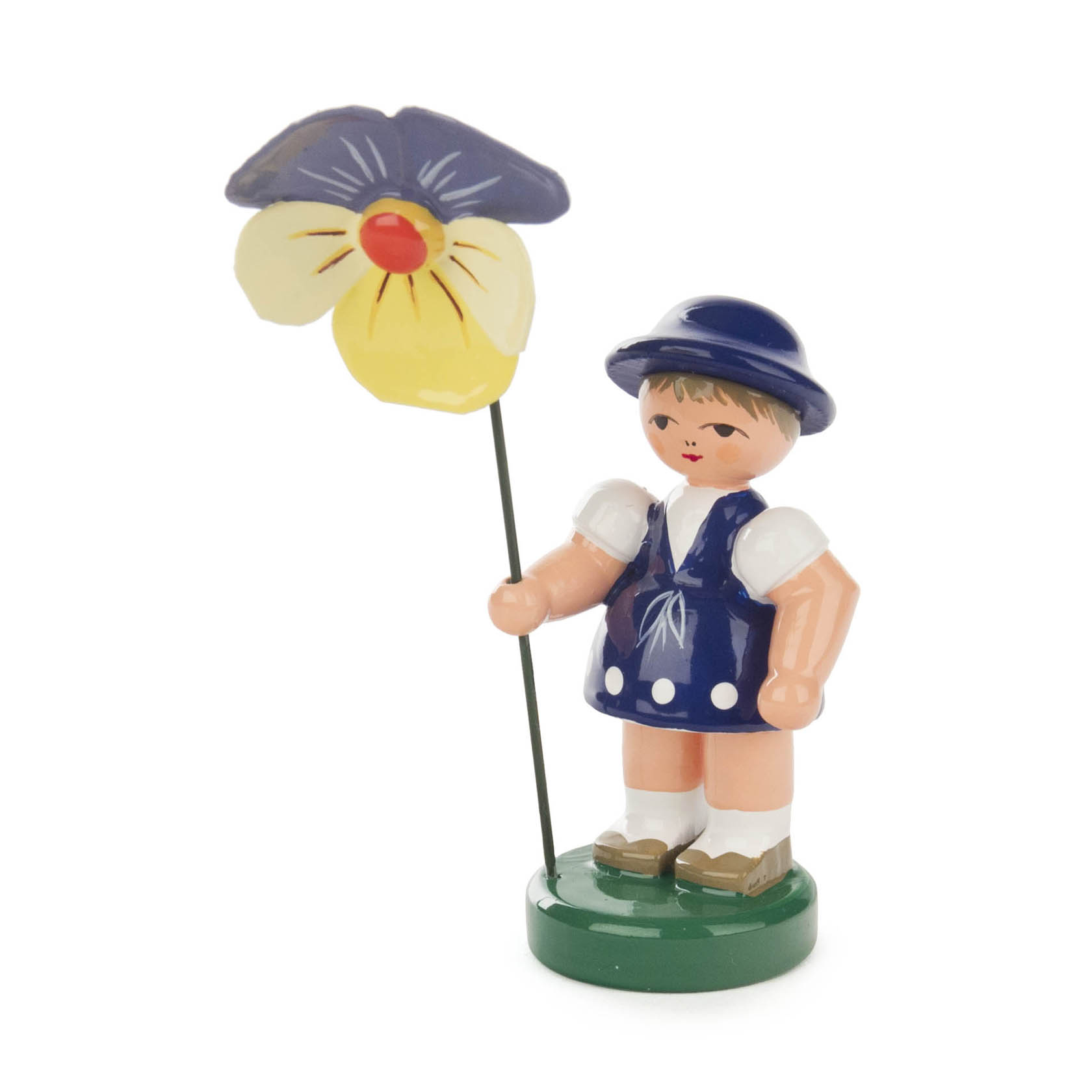 Kleine Holzfigur eines Mädchens in dunkelblauem Kleid und Hut, hält eine große Blume mit blauen und gelben Blütenblättern. im Dregeno Online Shop günstig kaufen