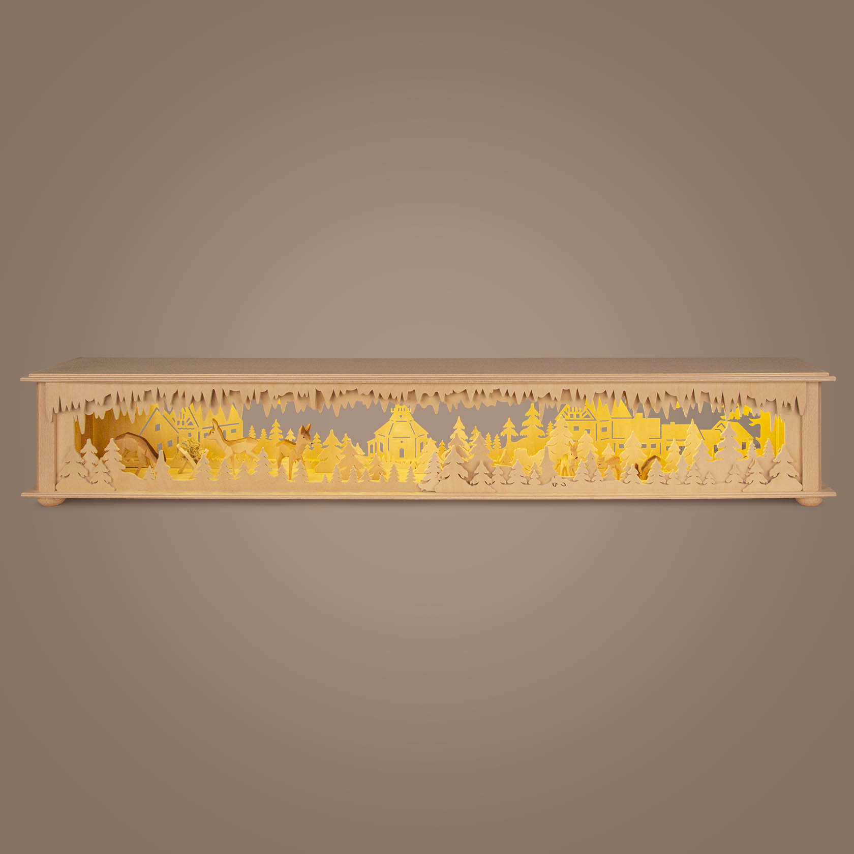 Wooden LED arch base with forest scene including trees, deer, and a nativity scene. Soft warm lighting enhances the carved details.