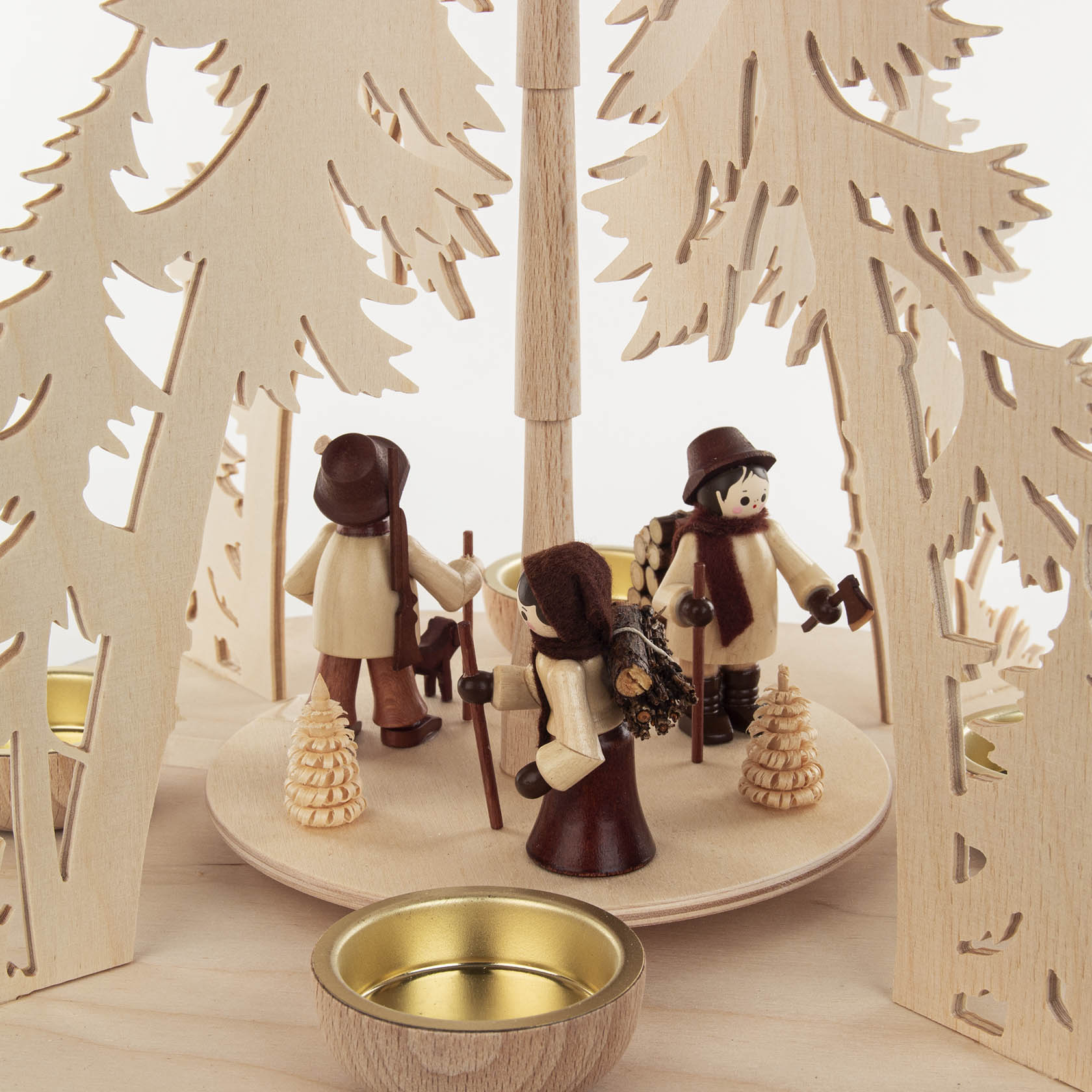 wooden pyramid with forest people