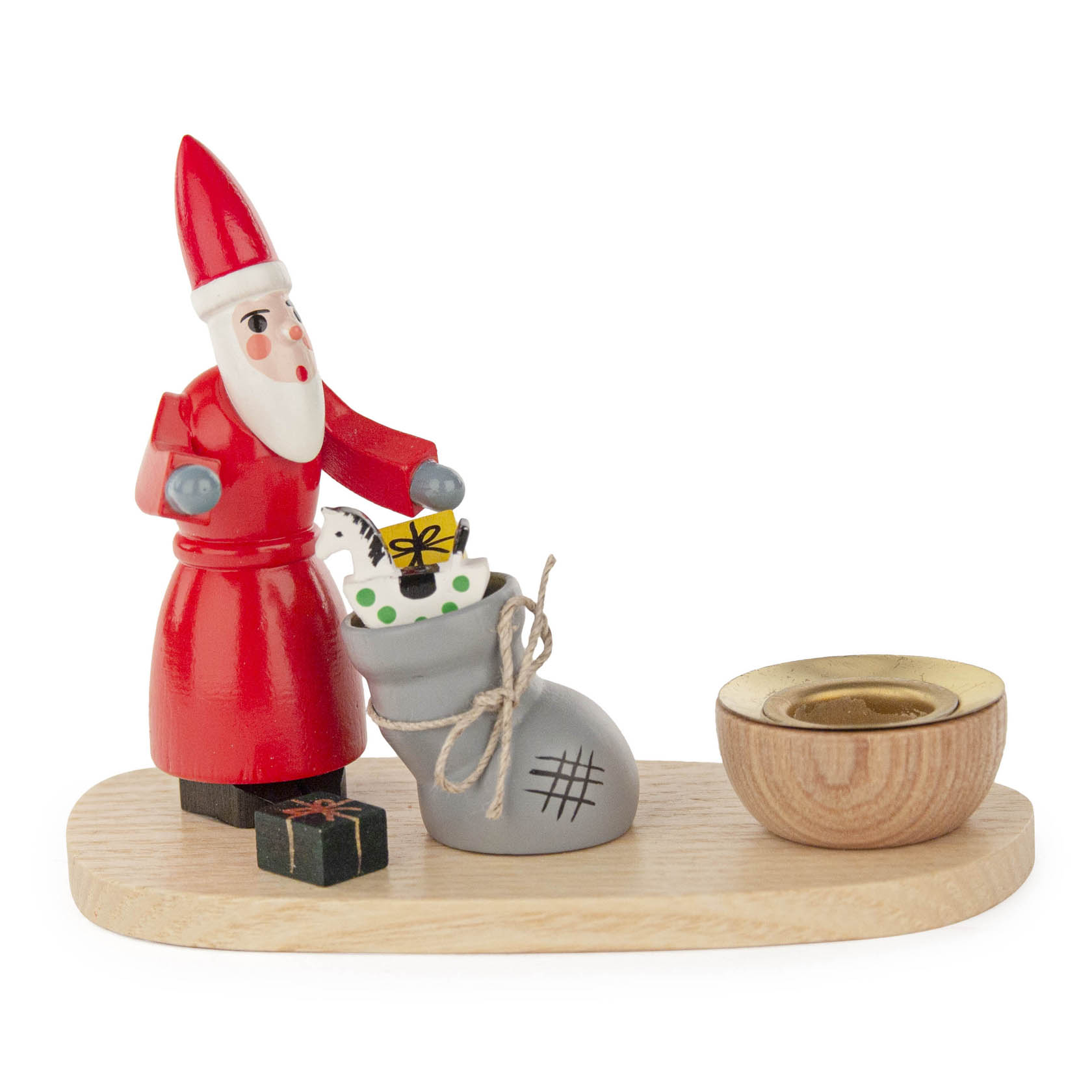 Wooden candle holder featuring a wooden Santa Claus figurine placing wrapped gifts into a grey sack next to a small circular holder. im Dregeno Online Shop günstig kaufen