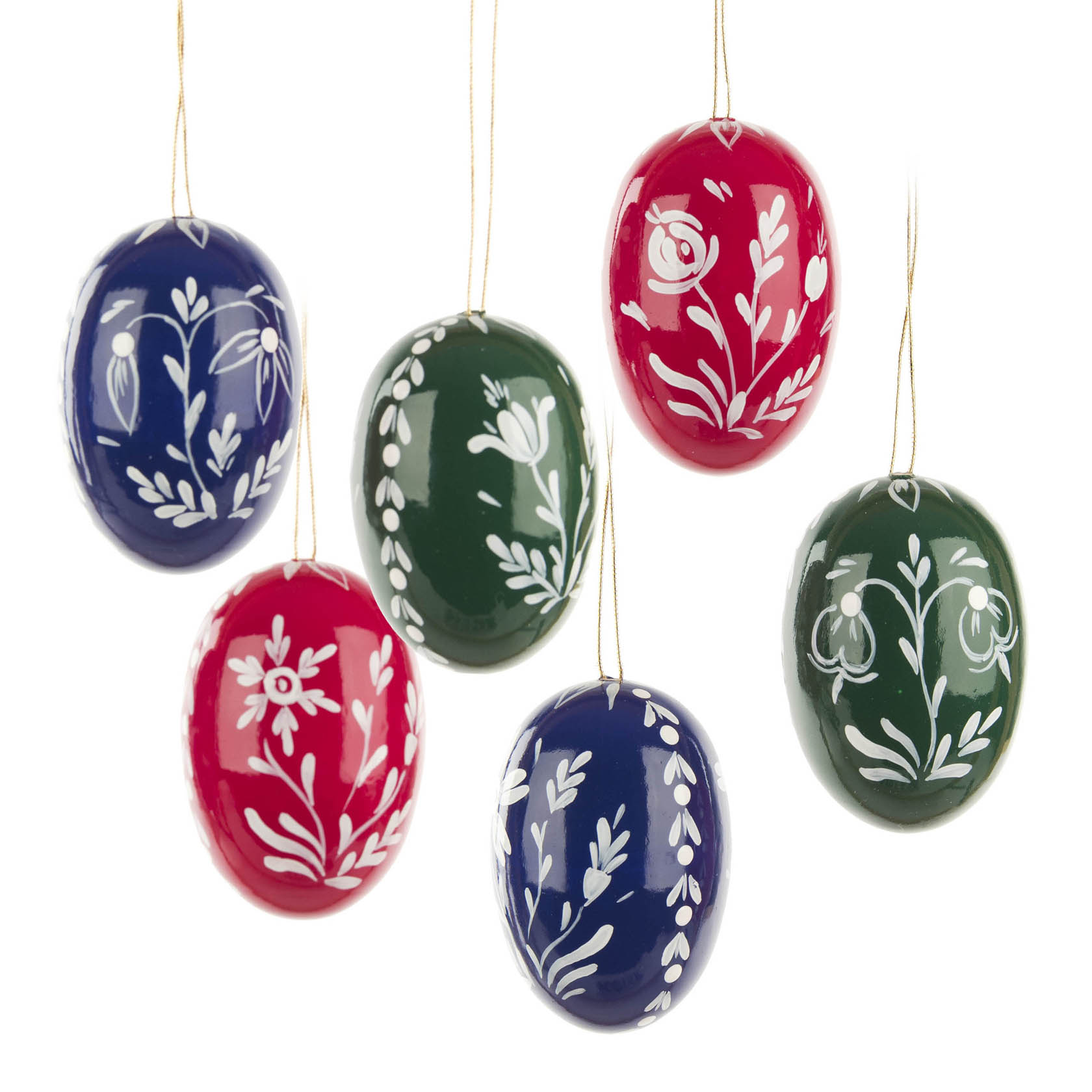 Sechs handbemalte Ostereier in Rot, Blau und Grün mit weißen Blumenmustern. Jedes Ei ist fein detailliert und hängt an einem goldenen Faden. im Dregeno Online Shop günstig kaufen
