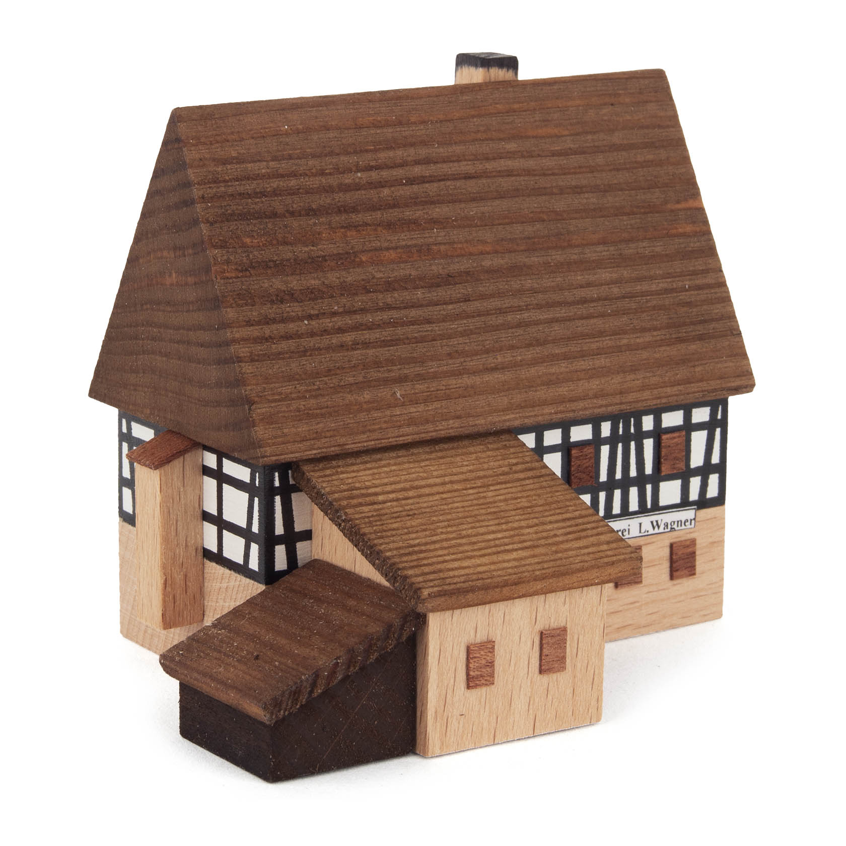 Kleines Holzmodell eines zweistöckigen Fachwerkhauses mit Werkstattanbau, braunem Satteldach und Schornstein. im Dregeno Online Shop günstig kaufen