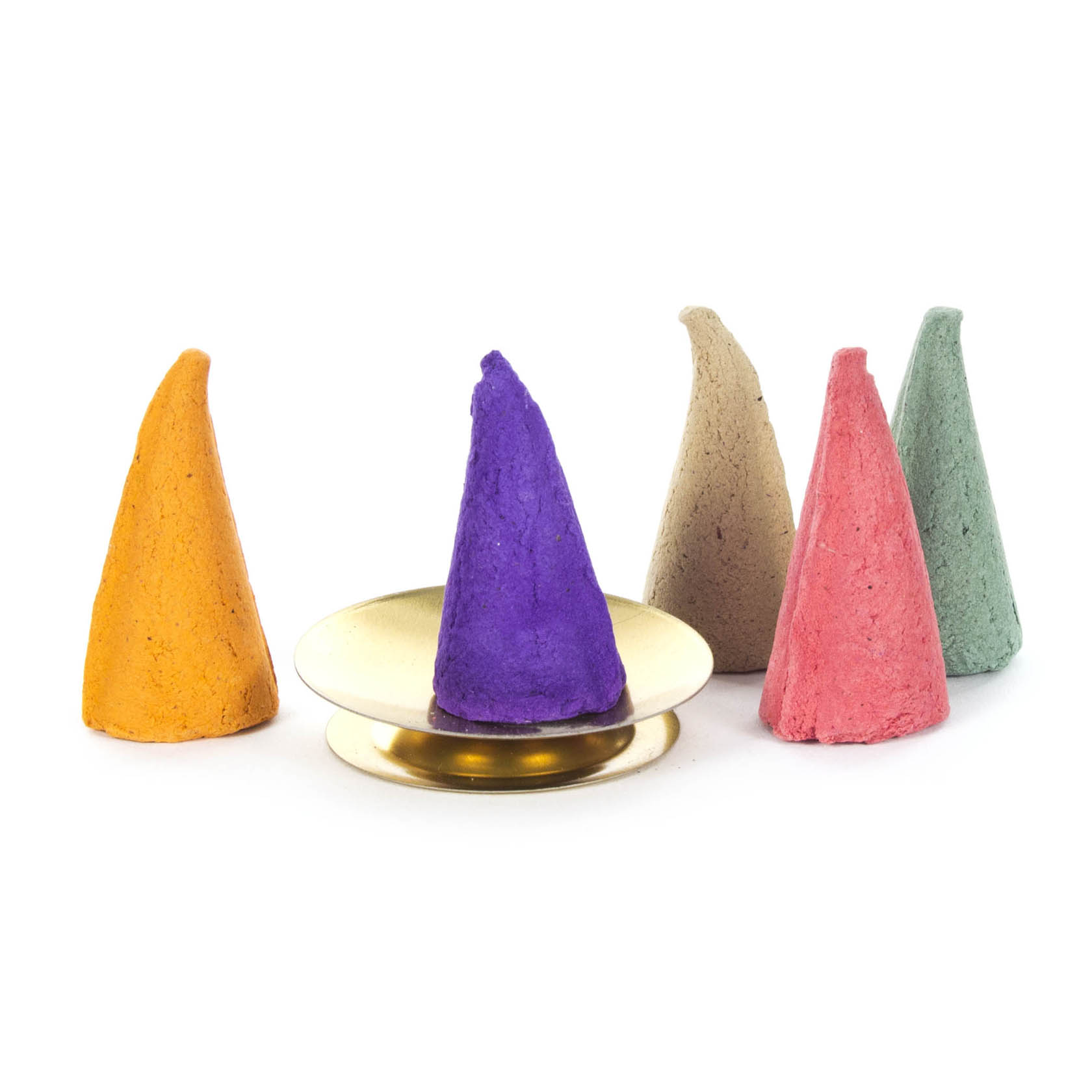 Five colorful XXL incense cones in orange, purple, beige, pink, and green are standing around a golden glow dish.